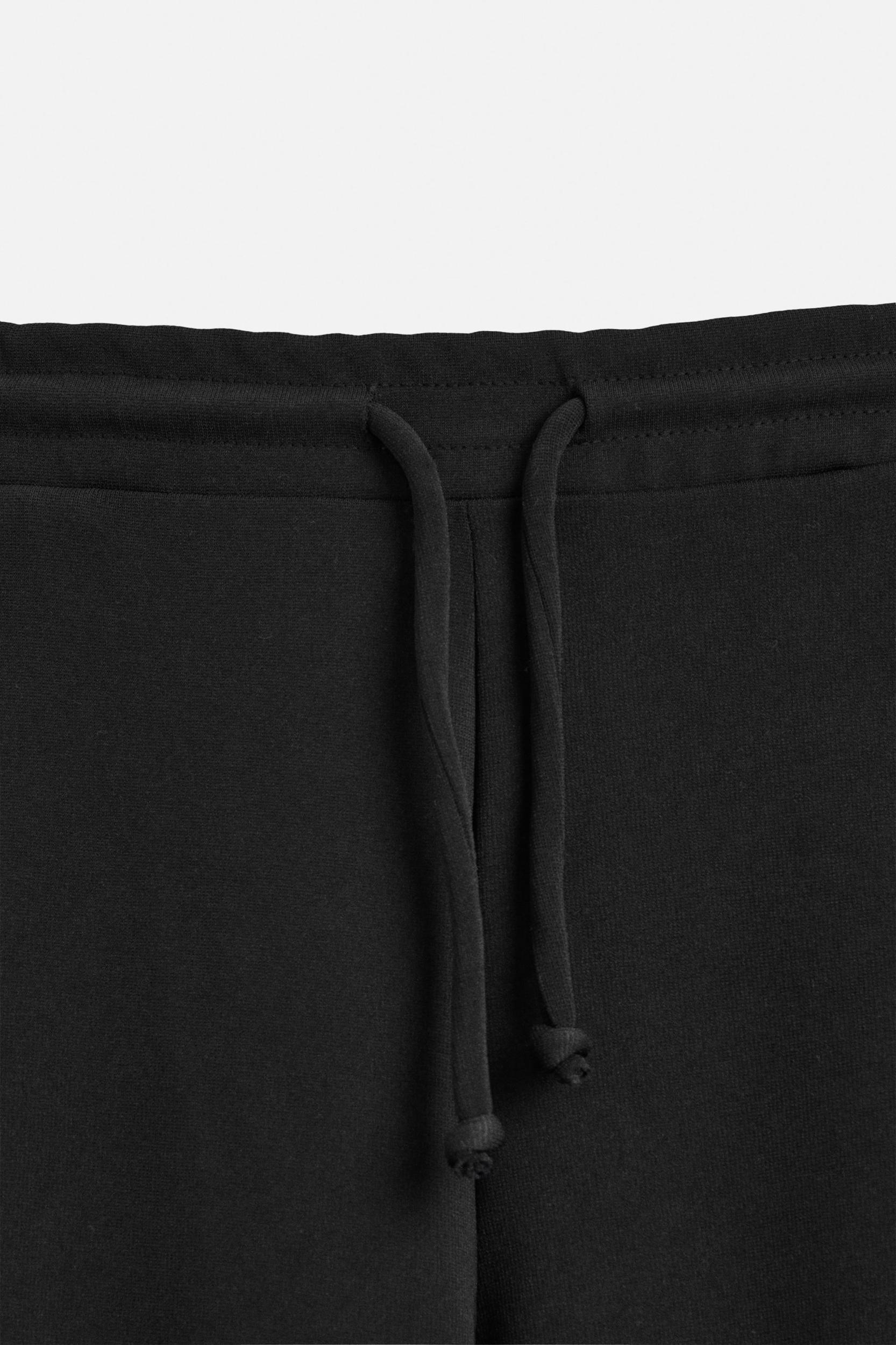 WIDE FIT INTERLOCK STRUCTURE PANTS Product Image