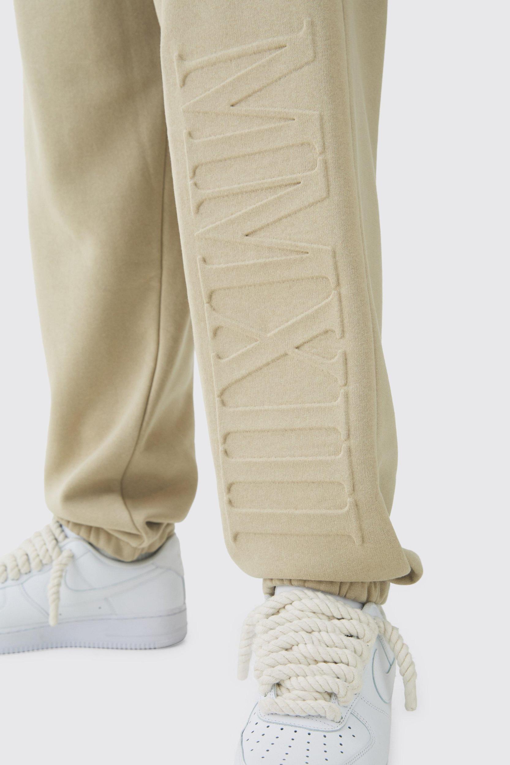 Tall Oversized MMXIII Embossed Sweatpants | boohooMAN USA Product Image