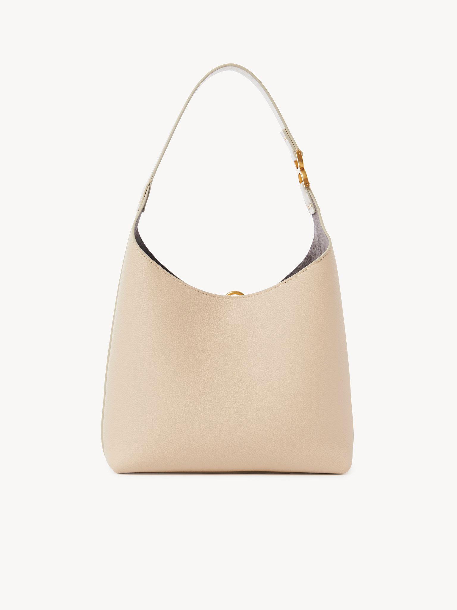 Small Marcie hobo bag in grained leather Product Image