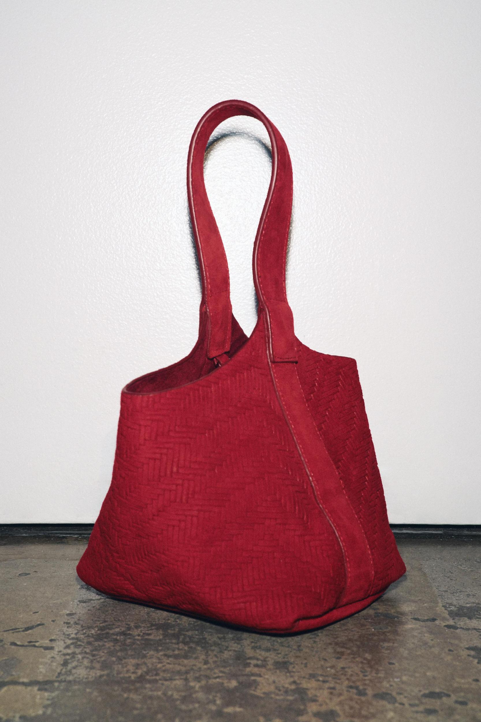 BRAIDED SPLIT LEATHER MINI BUCKET BAG Product Image