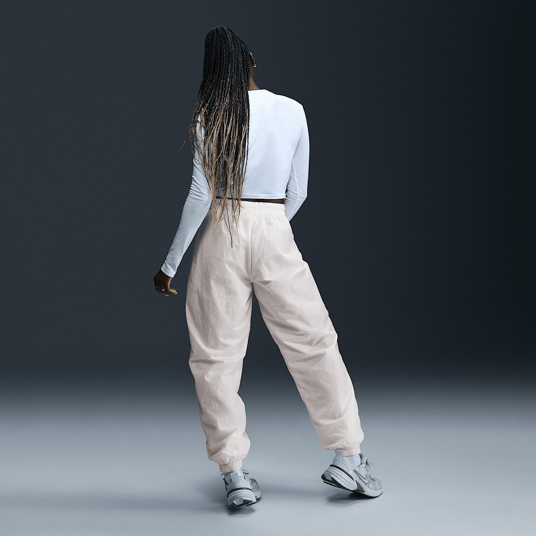 Womens Nike Sportswear Essential Mid-Rise Oversized Woven Jogger Pants | FV7668-004 Product Image