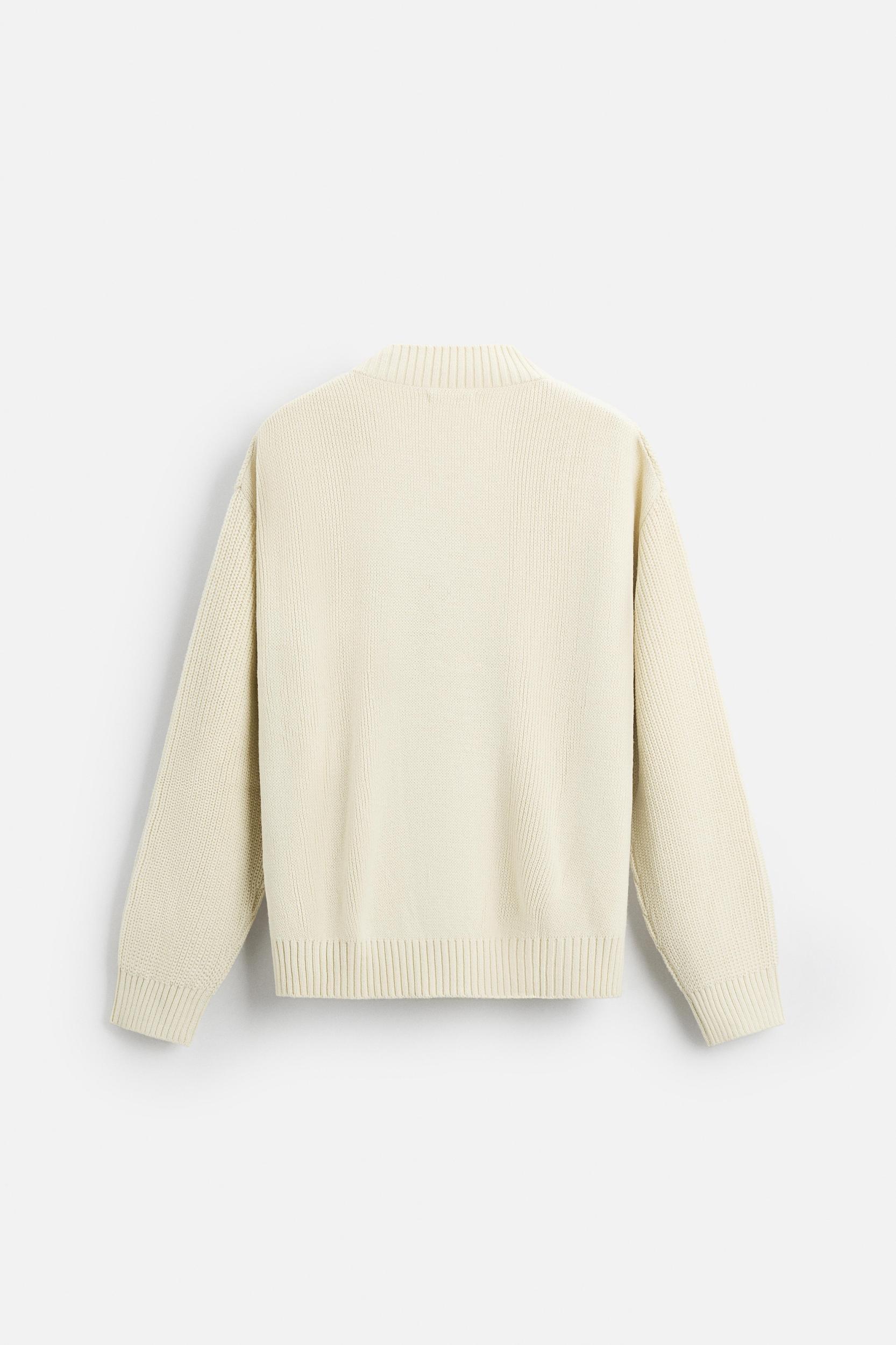 V-NECK STRUCTURED SWEATER Product Image