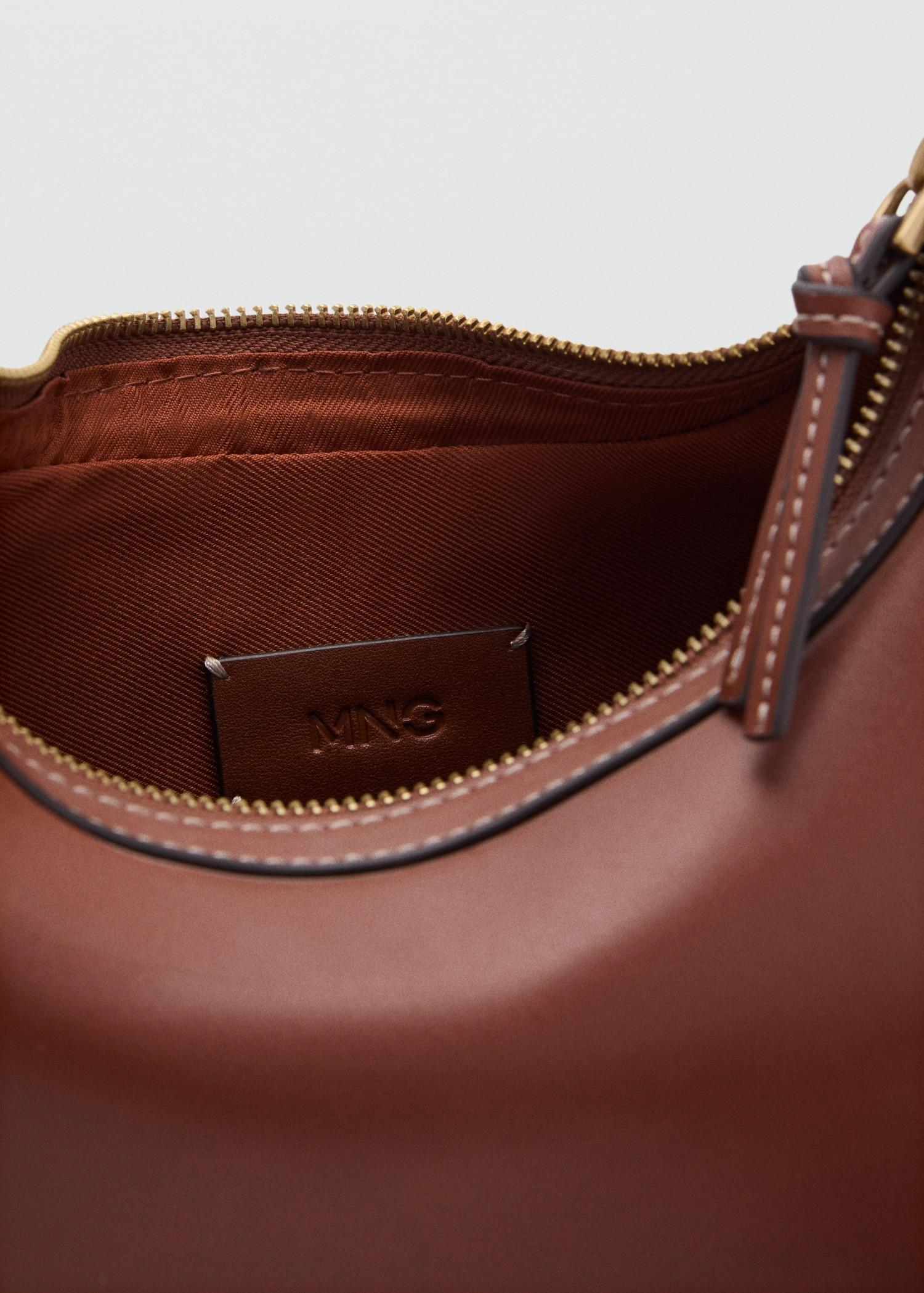 Oval shoulder bag - Women | MANGO USA Product Image