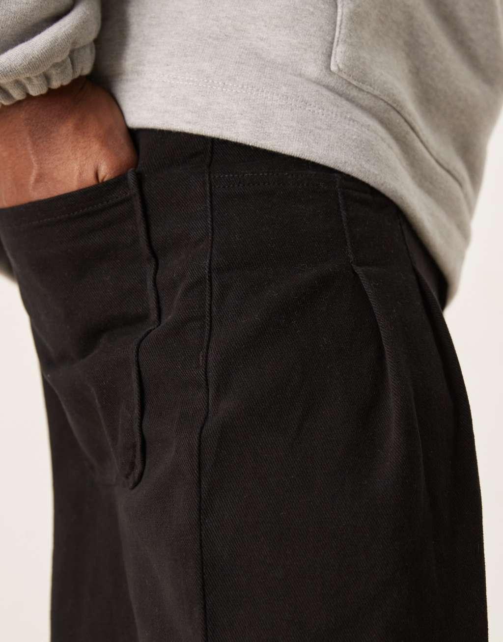 ASOS DESIGN super baggy pleated pants in black Product Image