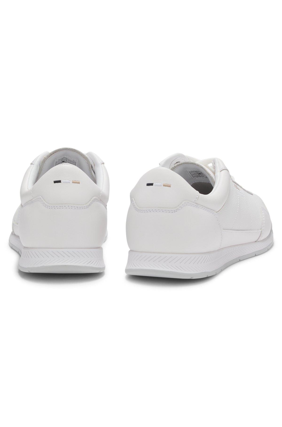 Faux-leather trainers with gold-tone branding Product Image