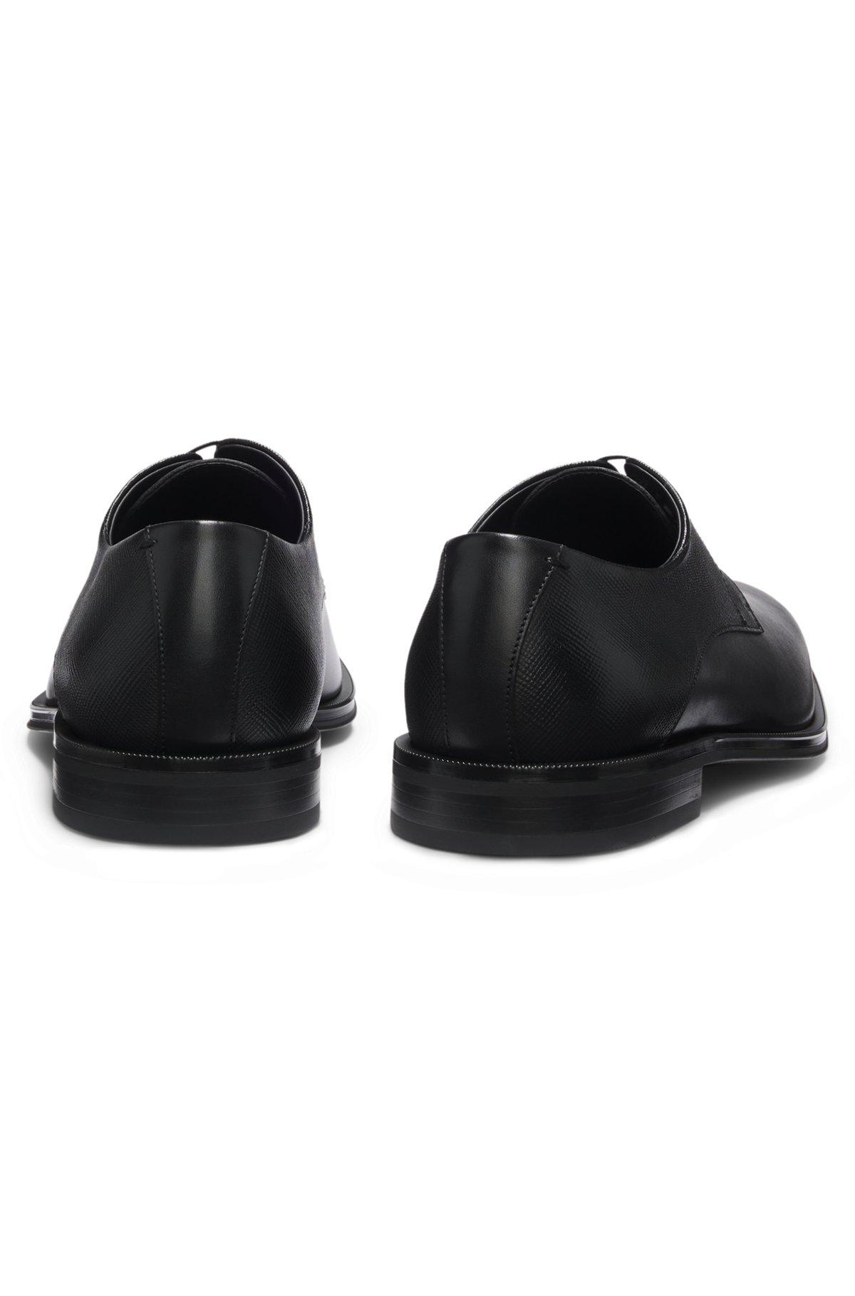 Derby shoes in textured and smooth leather Product Image