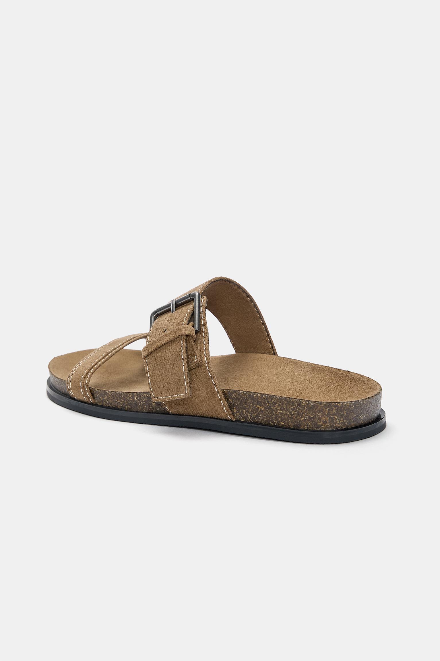 Flat sandals with buckles Product Image