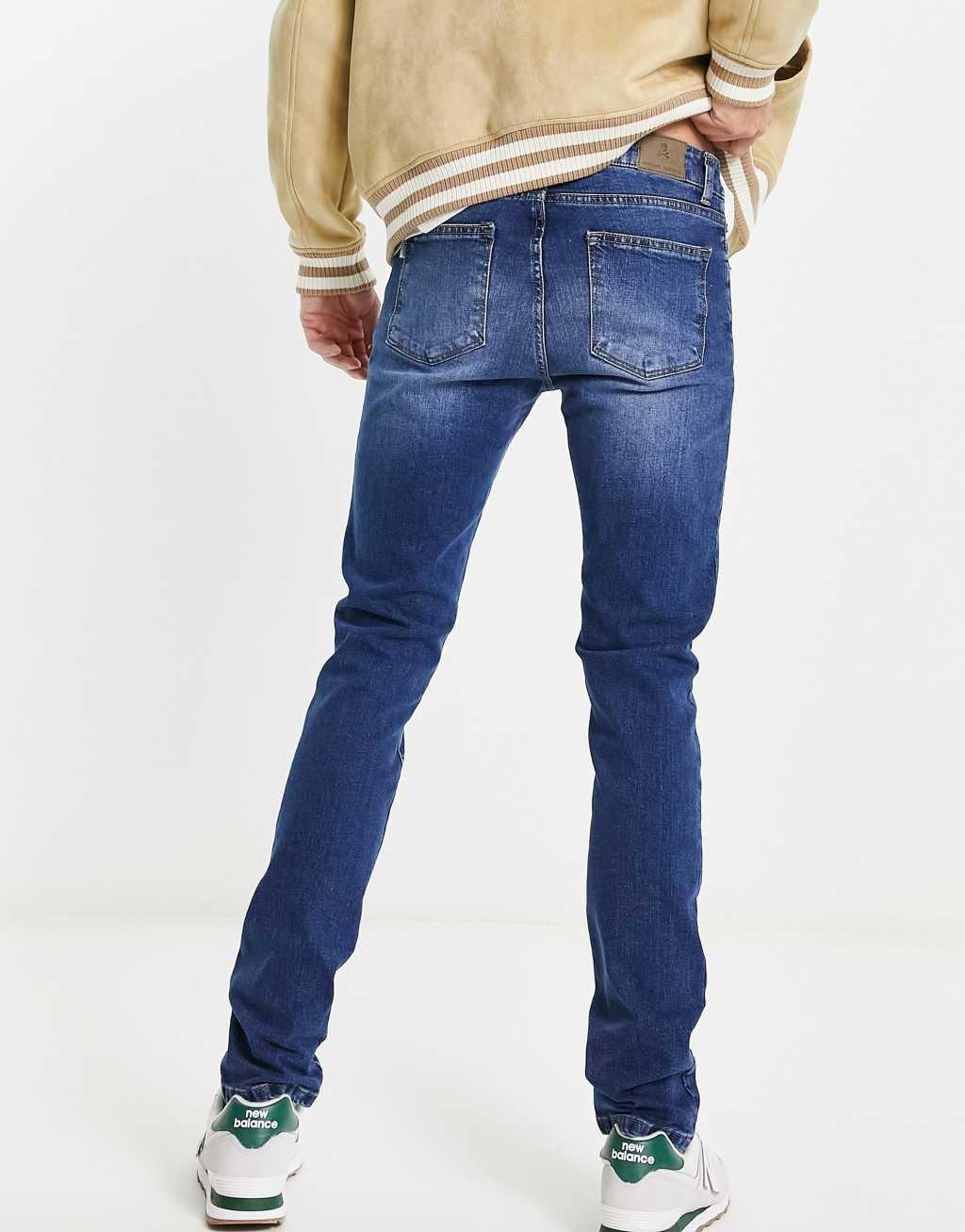 Scalpers slim jeans in medium blue Product Image