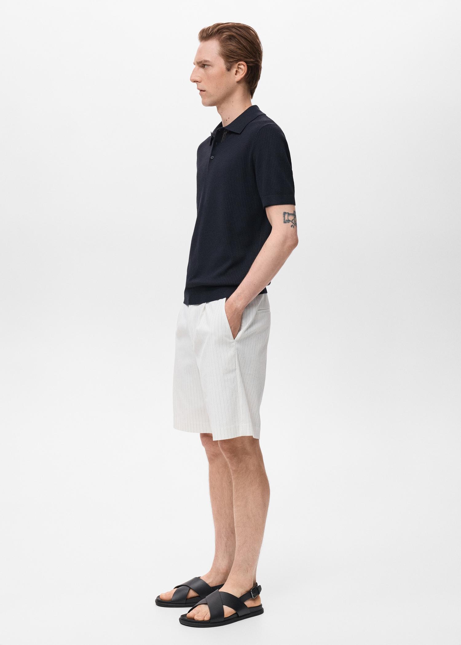 Ribbed knit polo shirt - Men | MANGO USA Product Image