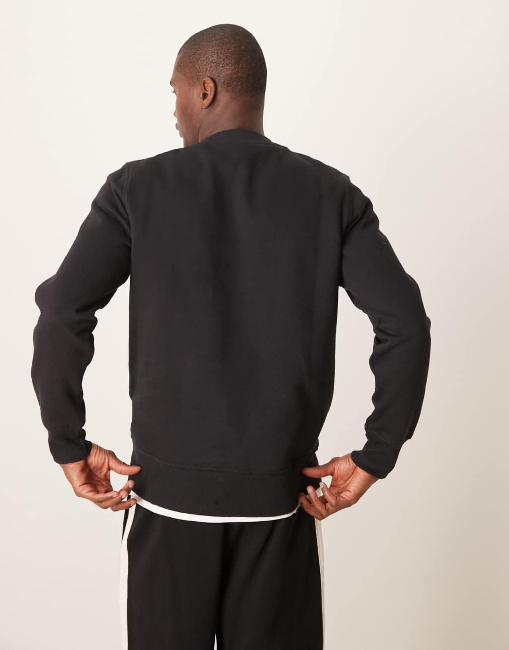 Calvin Klein Jeans minimal logo sweatshirt in black Product Image