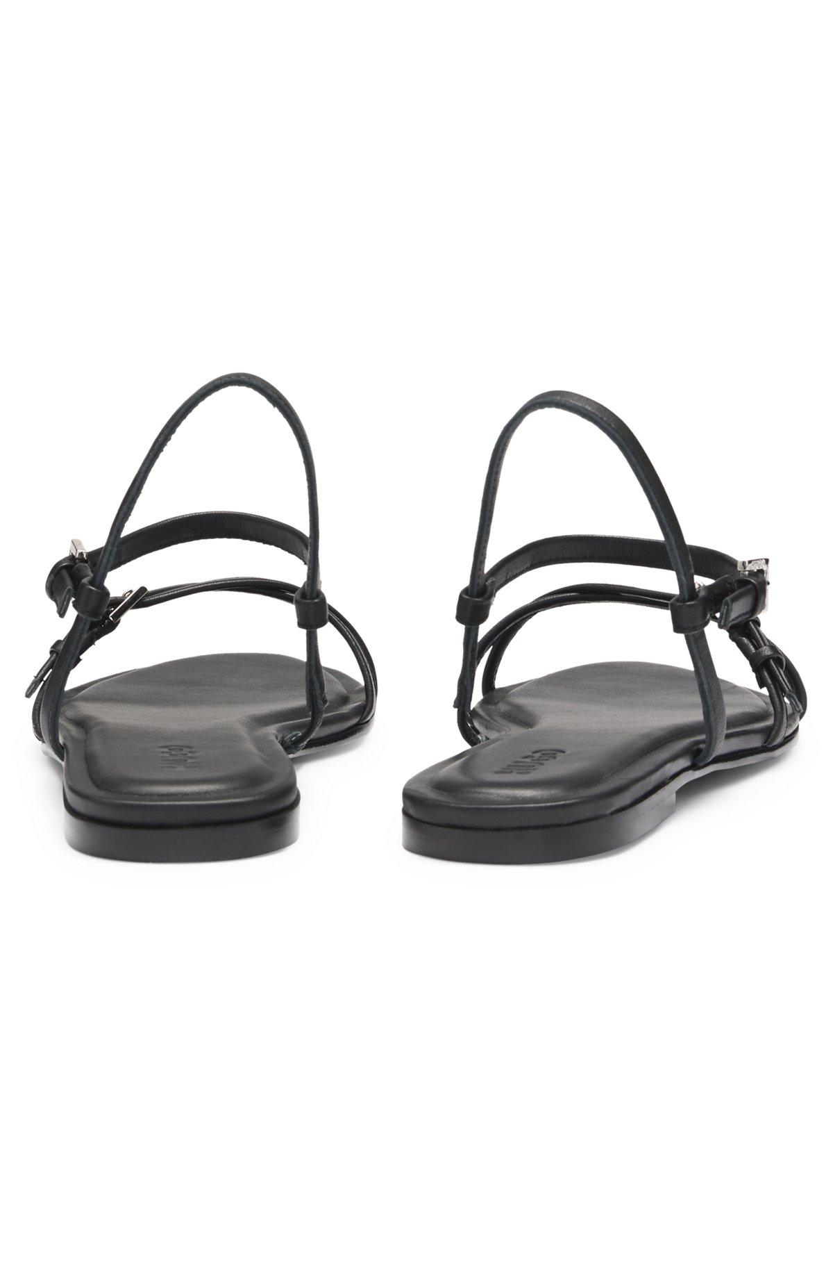Flat sandals in nappa leather with logo buckles Product Image