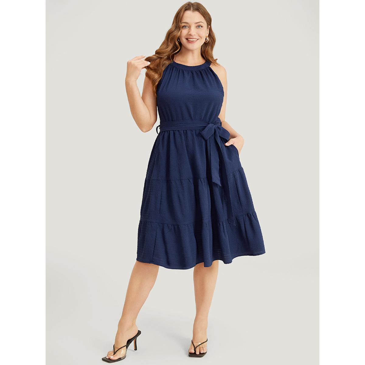 Plus Size Solid Knot Halter Pocket Belted Ruffles Tiered Hem Dress Indigo Women Elegant Gathered Halter neck Sleeveless Curvy Knee Dress BloomChic 12/L Product Image