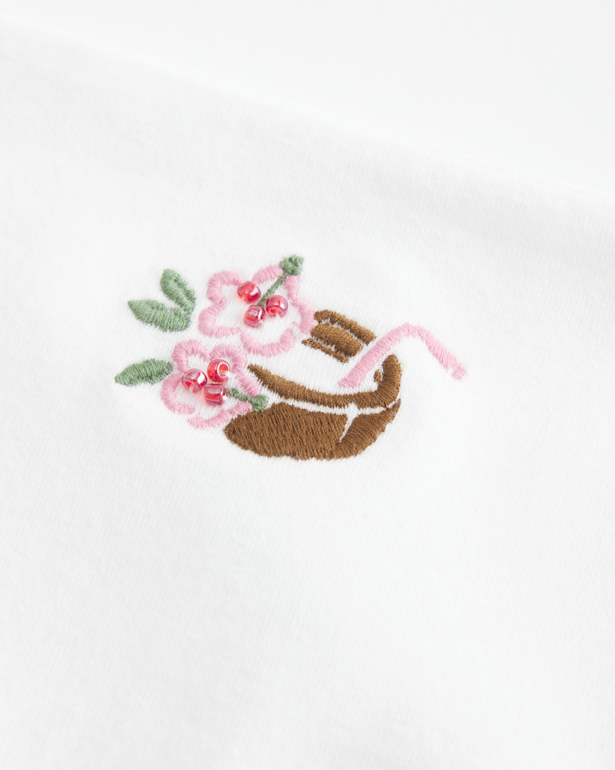 Beaded Graphic Halter Top Product Image