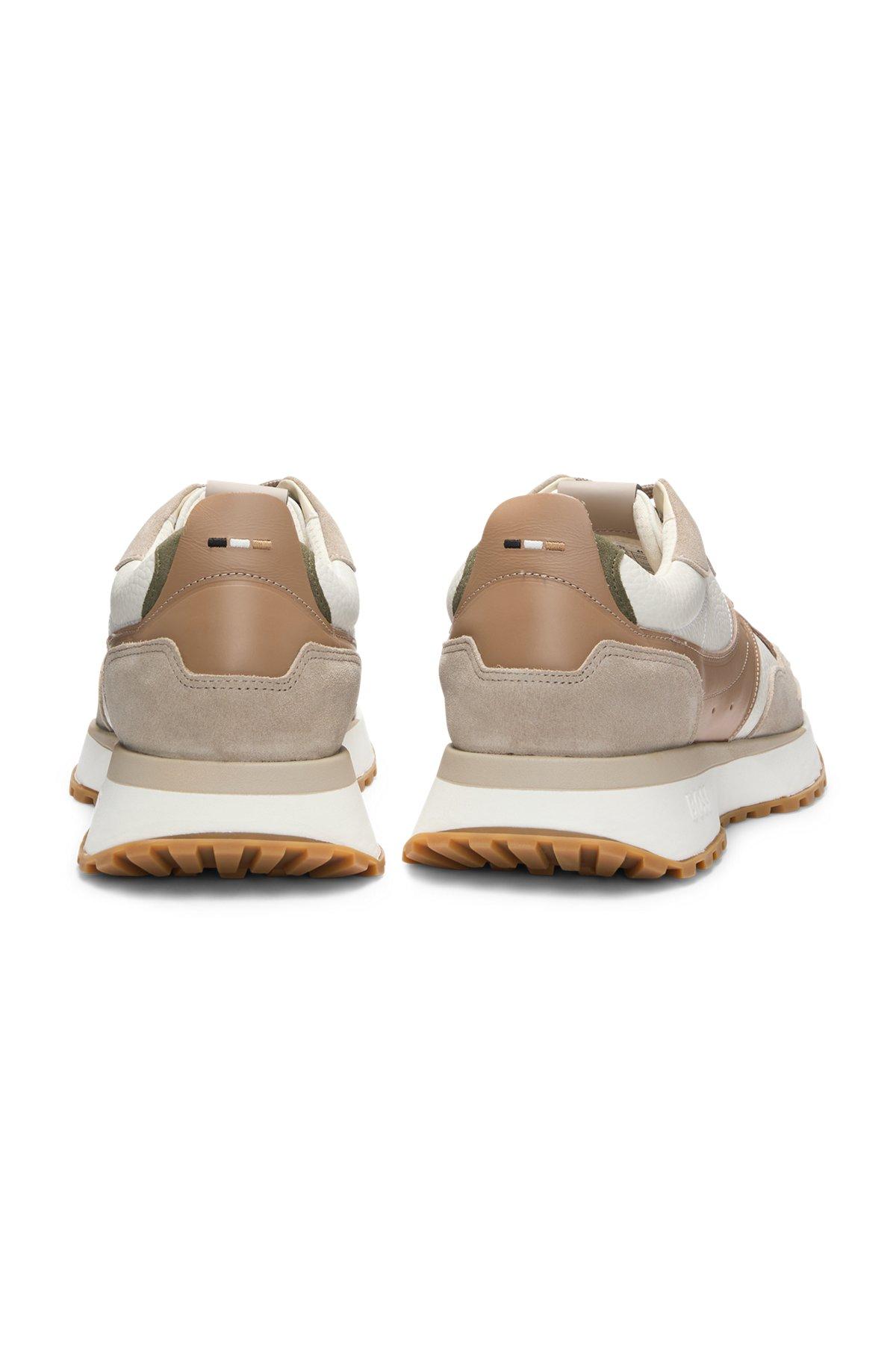 Trainers in tumbled leather with supportive outsole Product Image