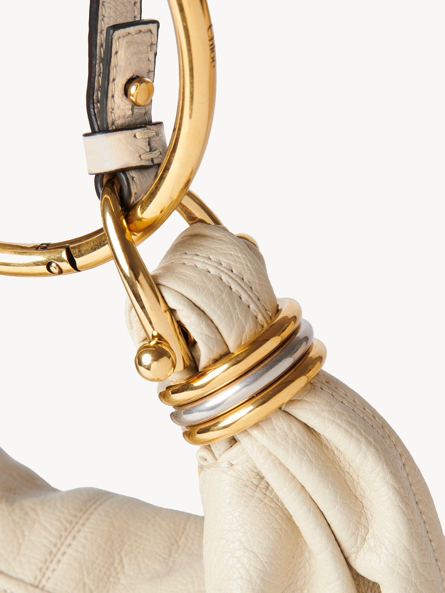 Small Bracelet Hobo bag in grained leather Product Image