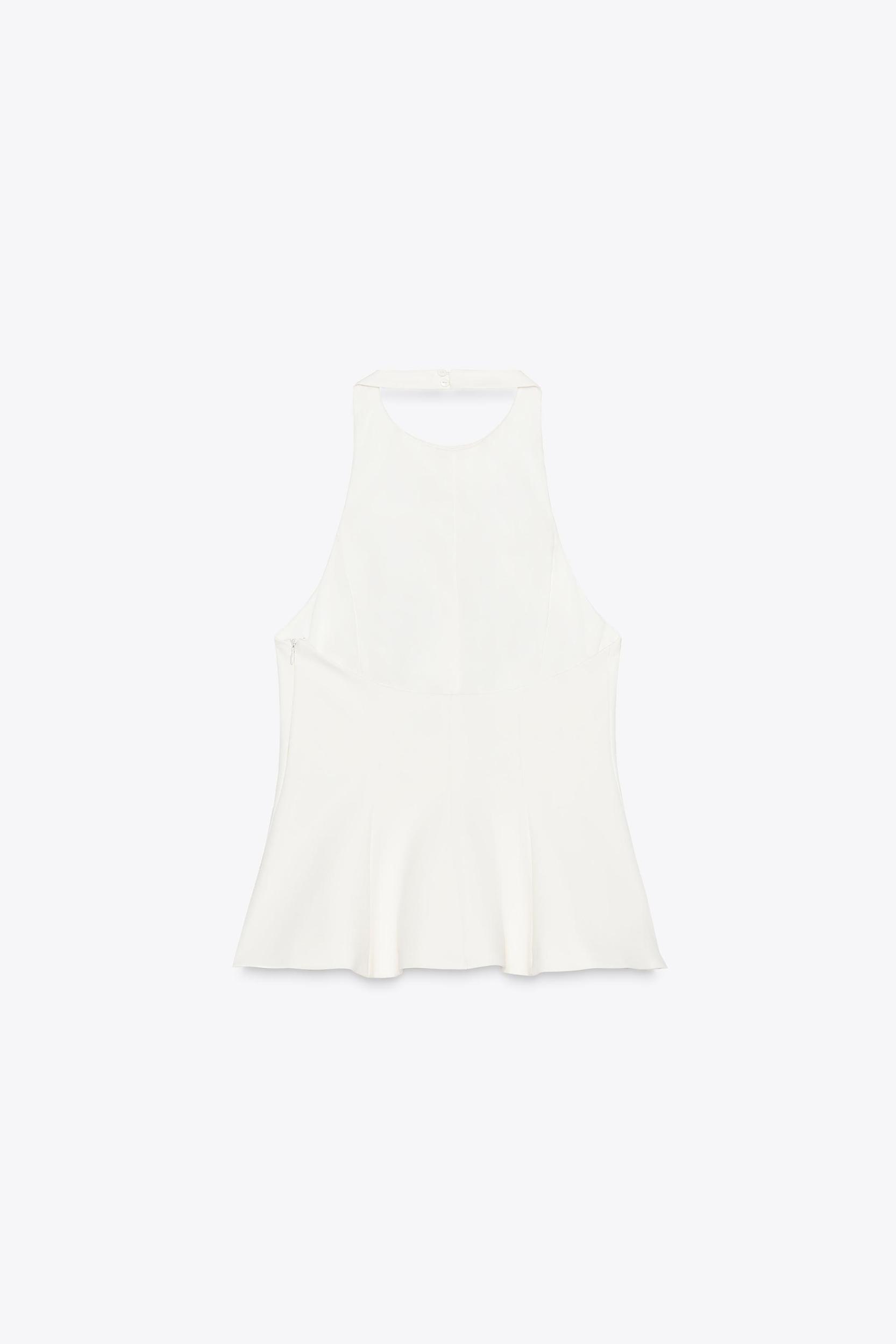 STRETCH PEPLUM TOP Product Image