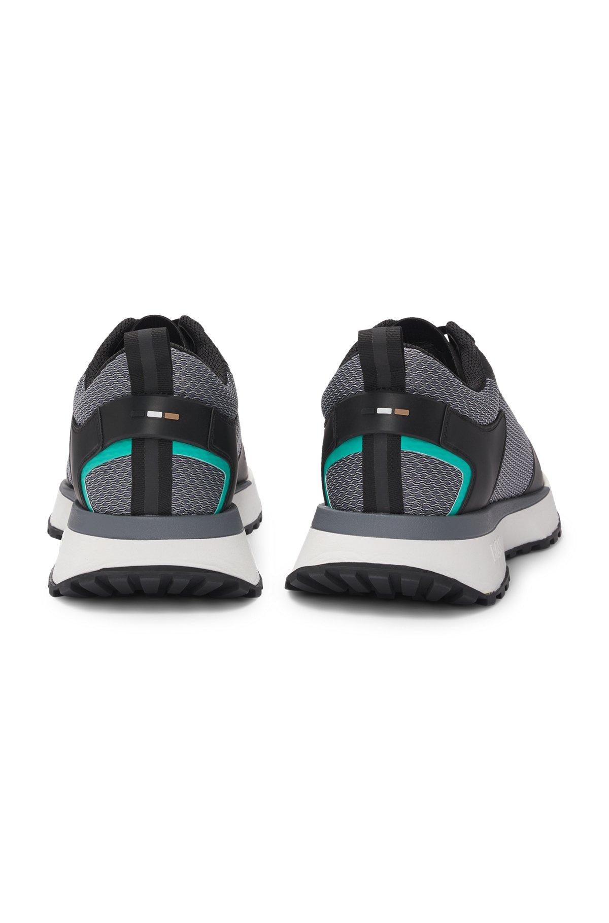 Mixed-material trainers with mesh details and branding Product Image