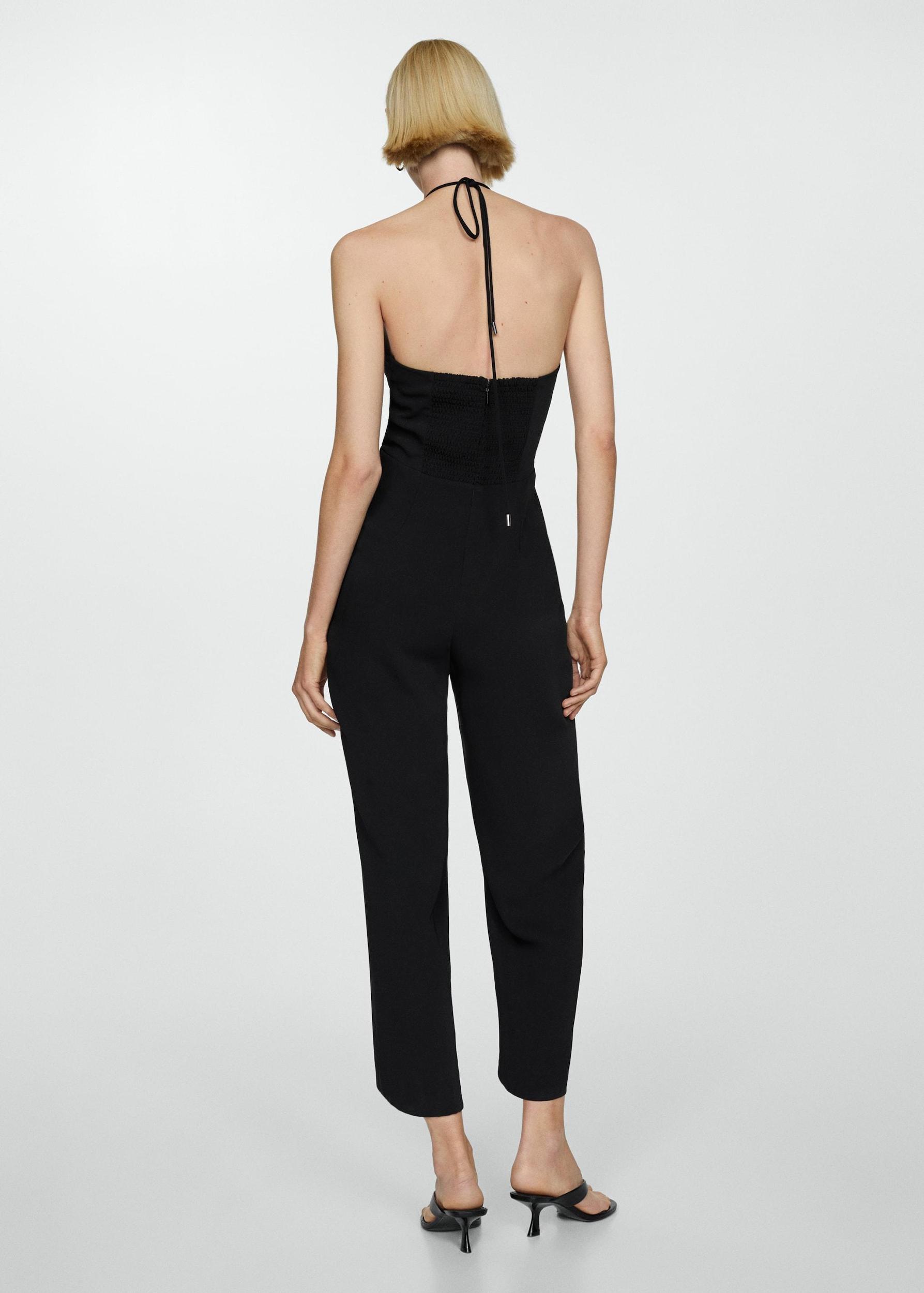 Halter-neck jumpsuit with ring - Women | MANGO USA Product Image