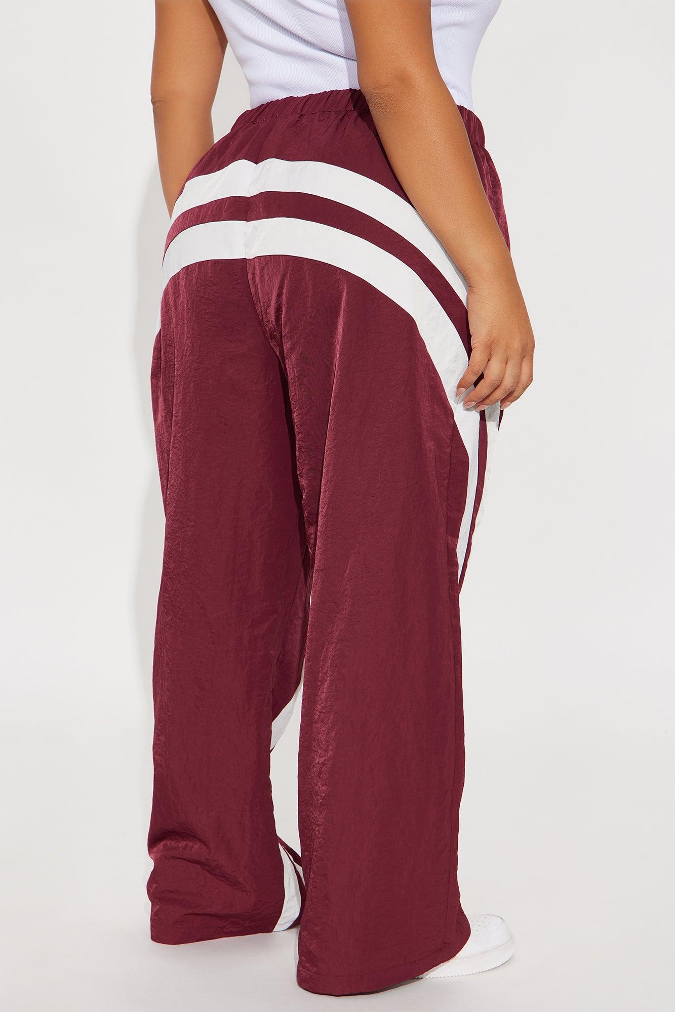 Follow The Curve Windbreaker Track Pant - Burgundy Female Product Image