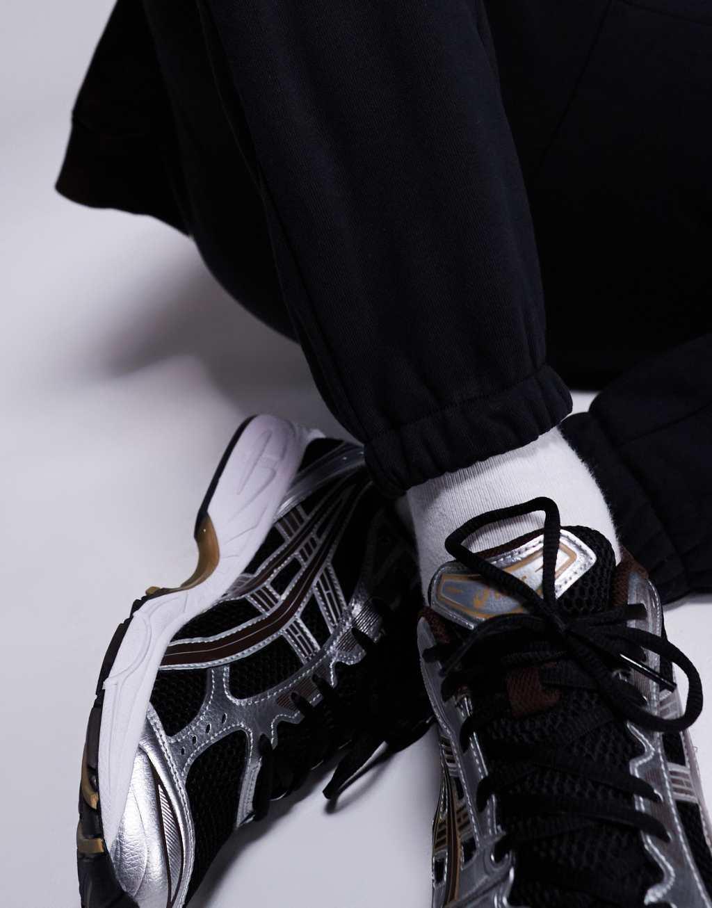 ASOS DESIGN premium heavyweight tapered sweatpants 400gsm in black Product Image