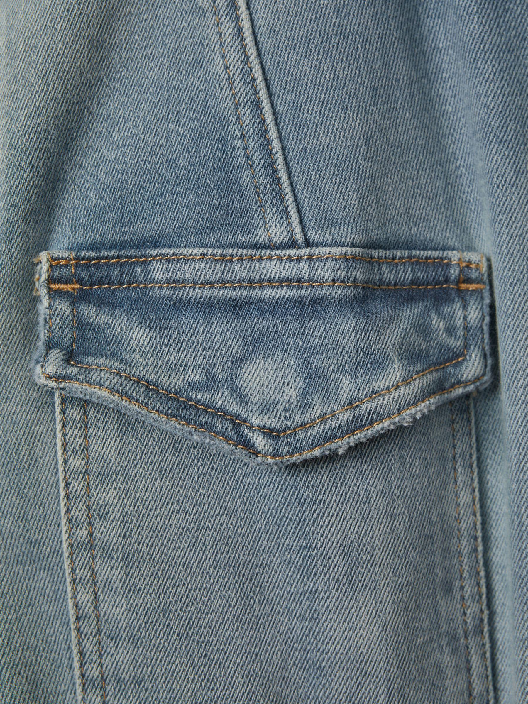 Good American Denim Long Sleeve Jumpsuit in Blue Product Image