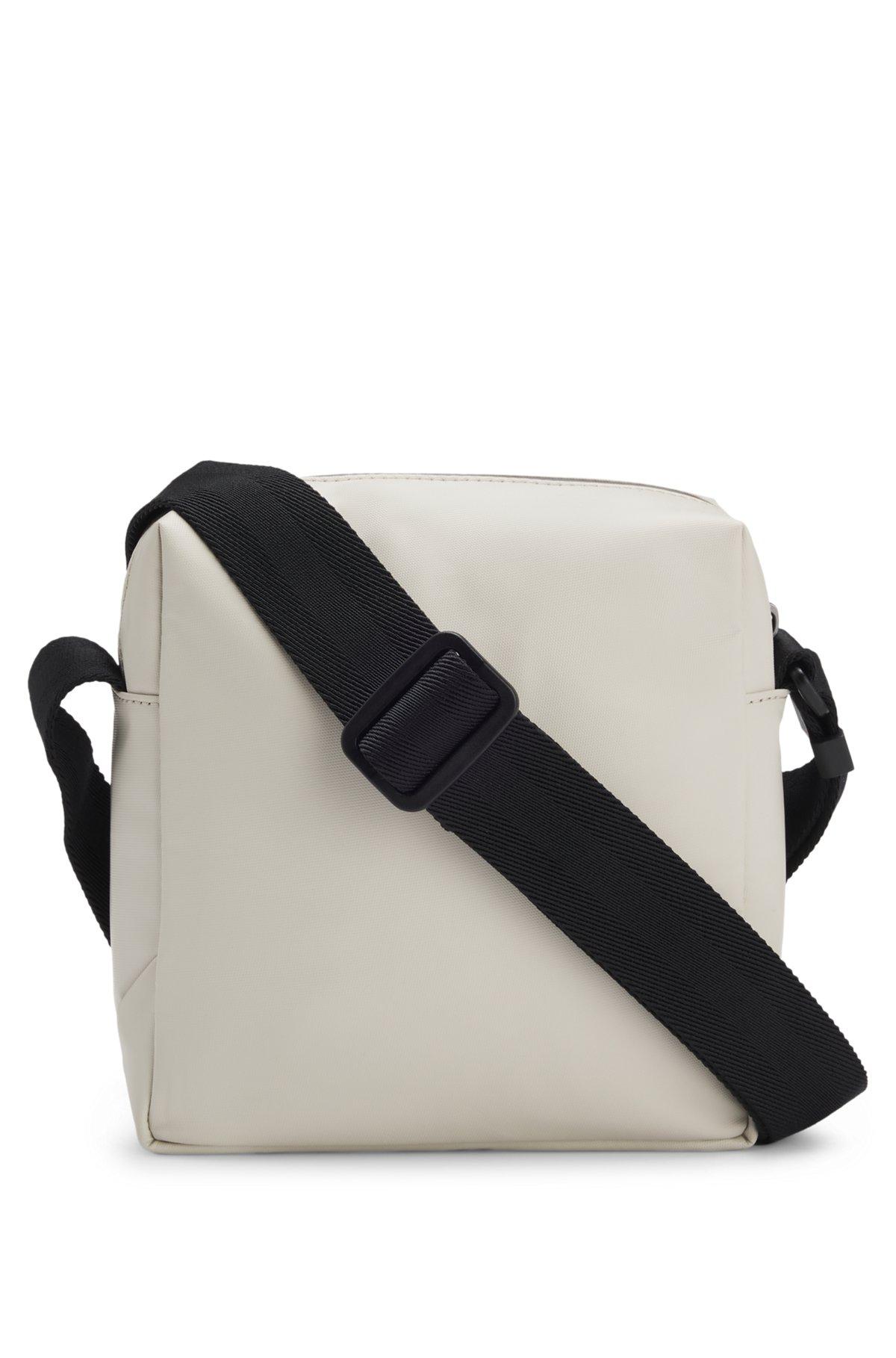 Reflective-detail reporter bag in faux leather Product Image
