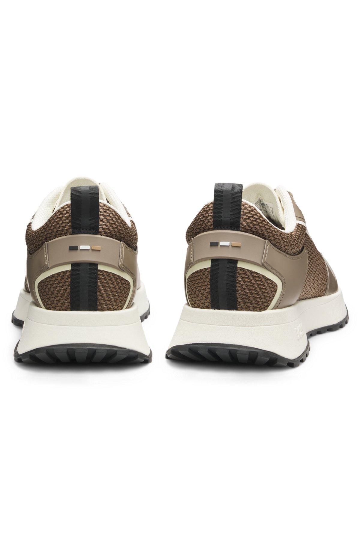 Mixed-material trainers with mesh details and branding Product Image