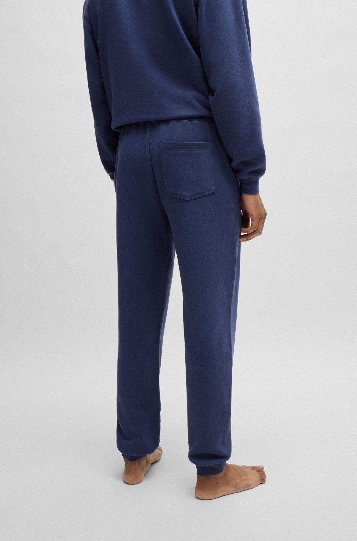 Cotton-terry tracksuit bottoms with flocked logo Product Image