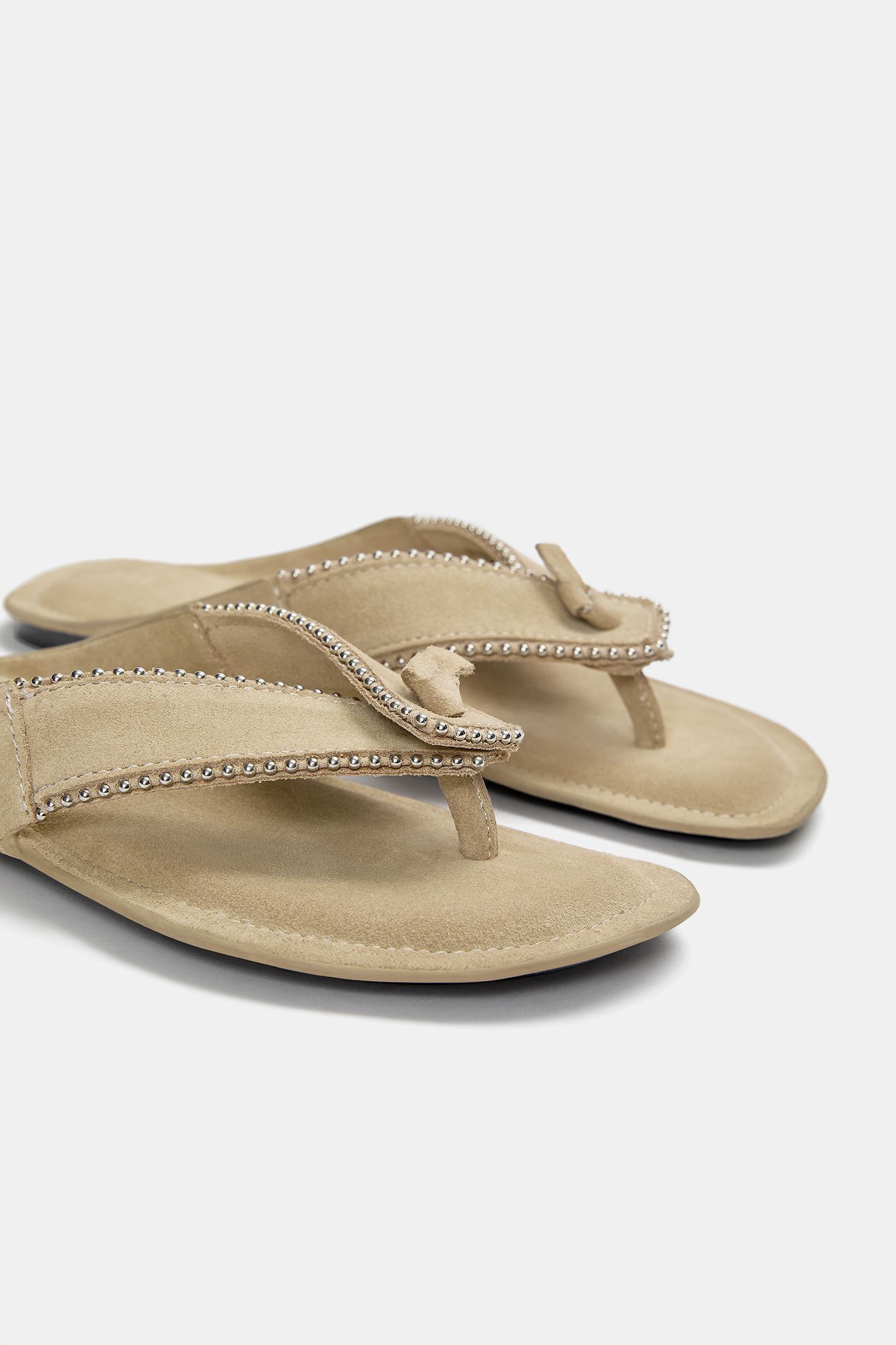 Flat sandals with leather embellishments Product Image