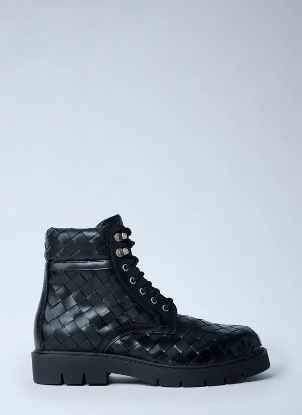 BOTTEGA VENETA Leather All-over Intrecciato Ankle Boots In Black Product Image