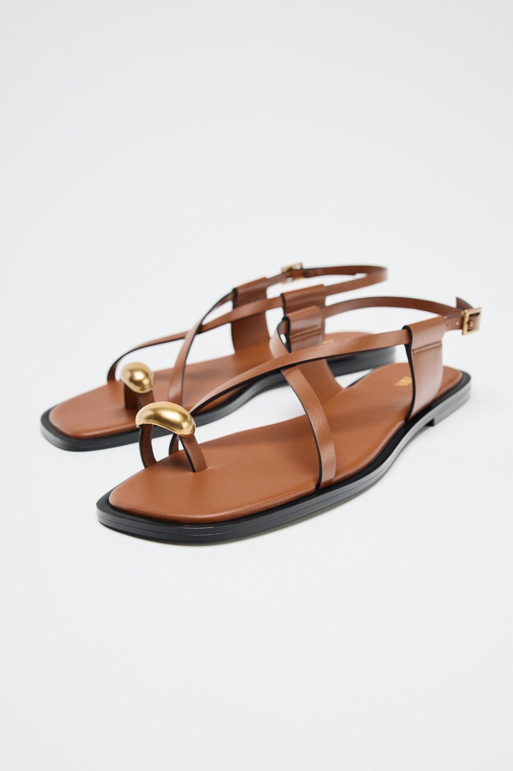FLAT SANDALS WITH STRAPS AND METAL DETAIL Product Image
