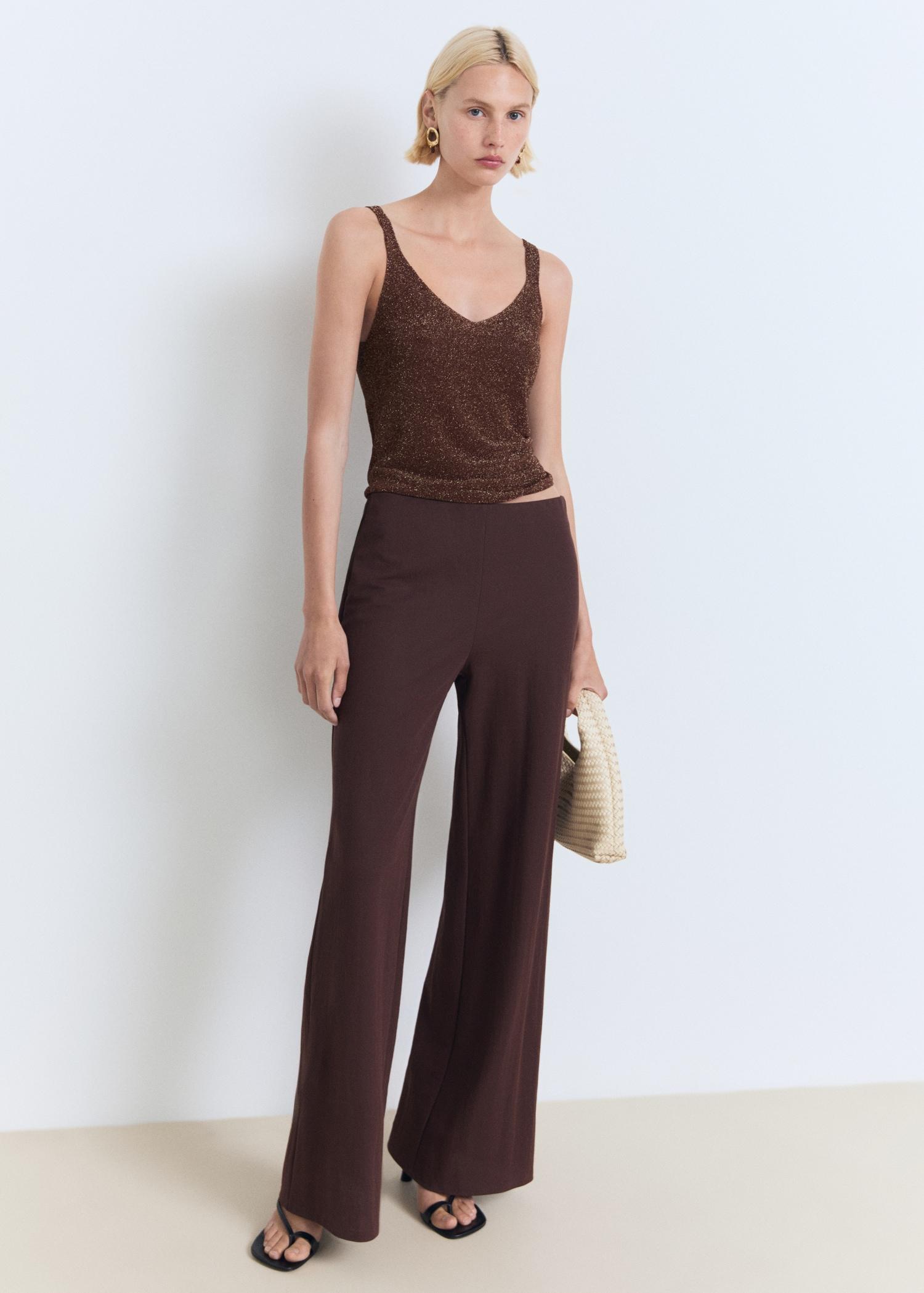 Lurex knitted V-neck top - Women | MANGO USA Product Image