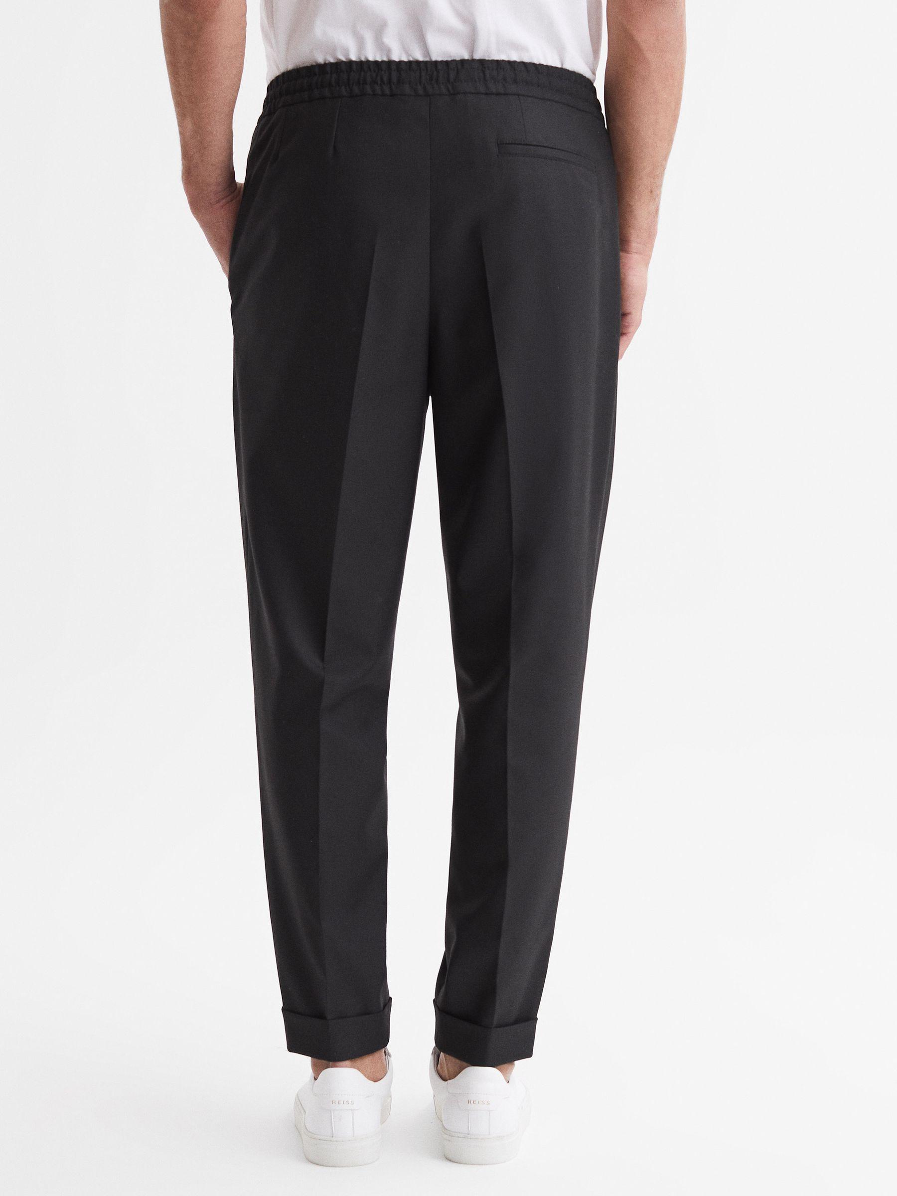 Relaxed Drawstring Trousers with Turn-Ups in Black Product Image