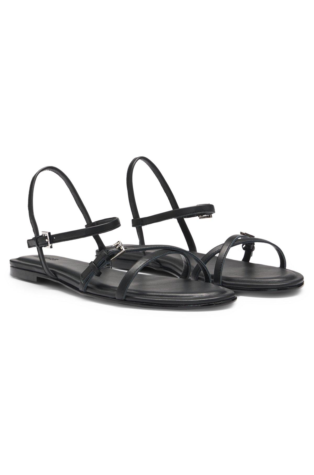 Flat sandals in nappa leather with logo buckles Product Image