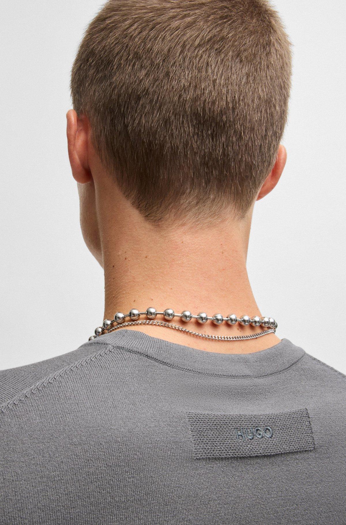 Relaxed-fit knitted sweater with V neckline Product Image