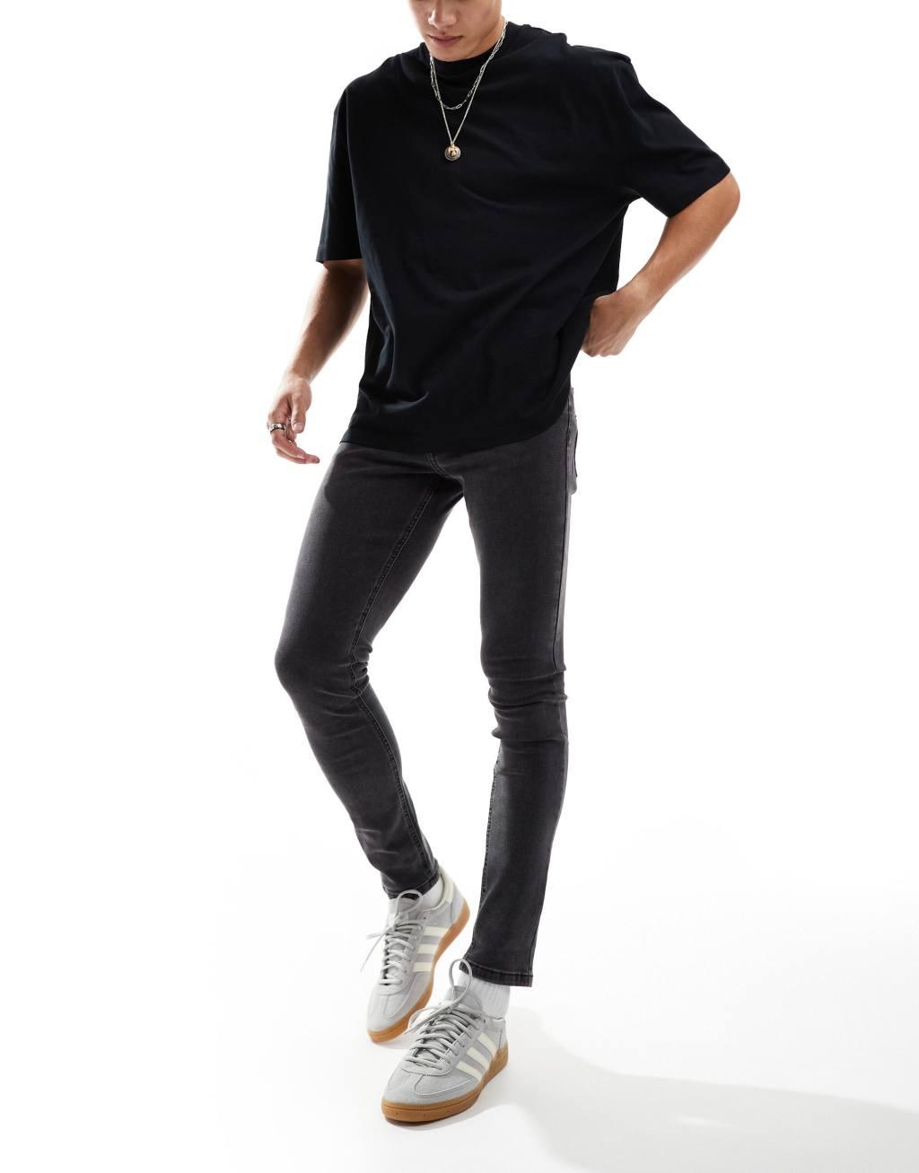 COLLUSION mid rise skinny jeans in washed black Product Image