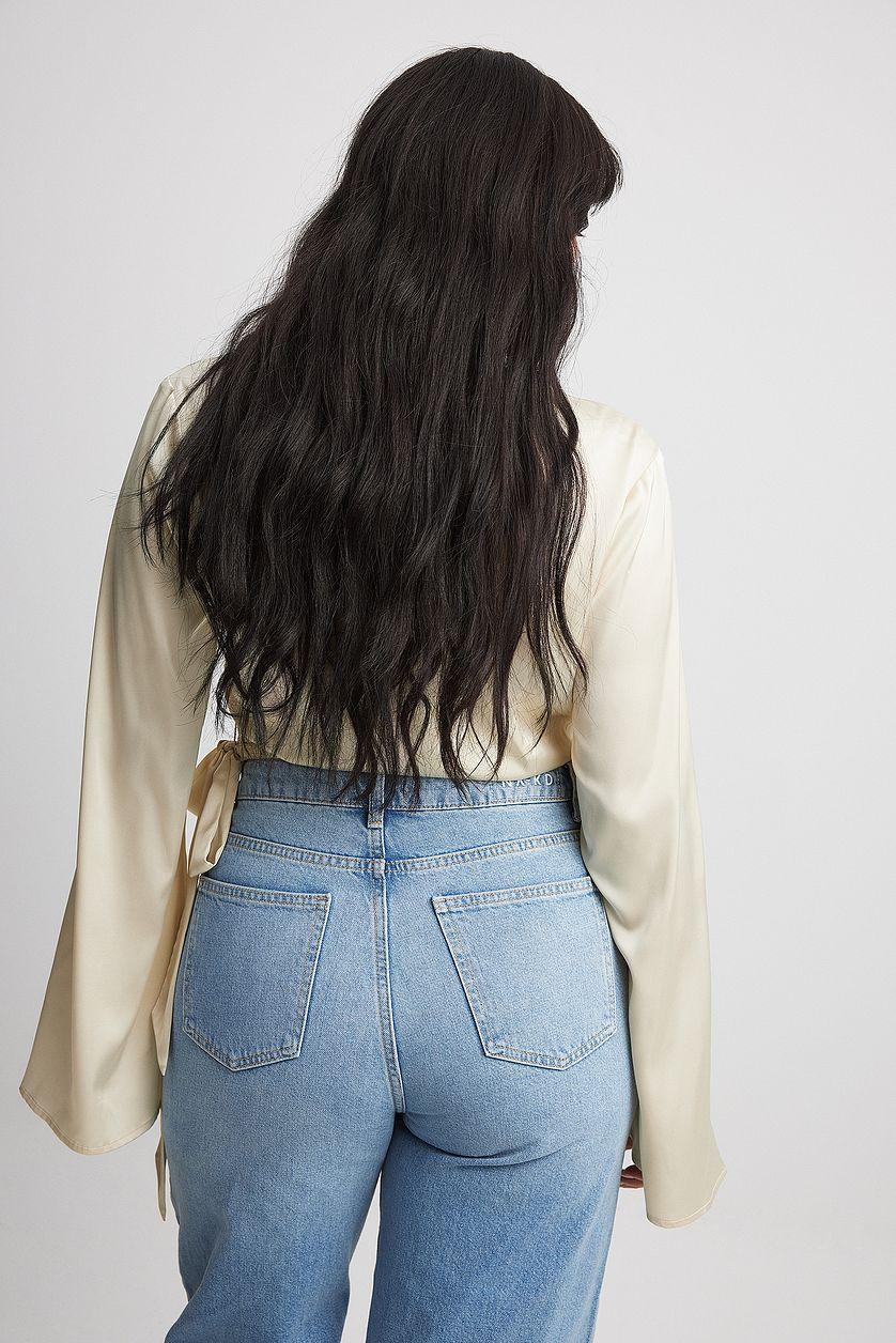 Trumpet Sleeve Wrap Front Satin Blouse Product Image