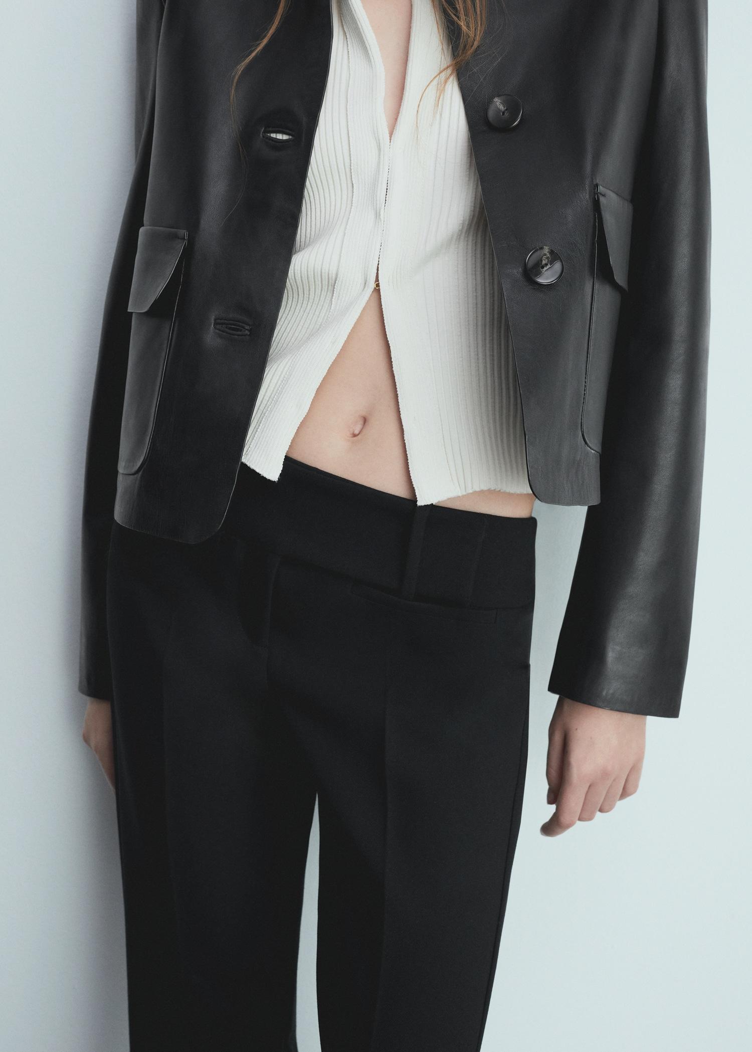 Low-rise flared pants - Women | MANGO USA Product Image