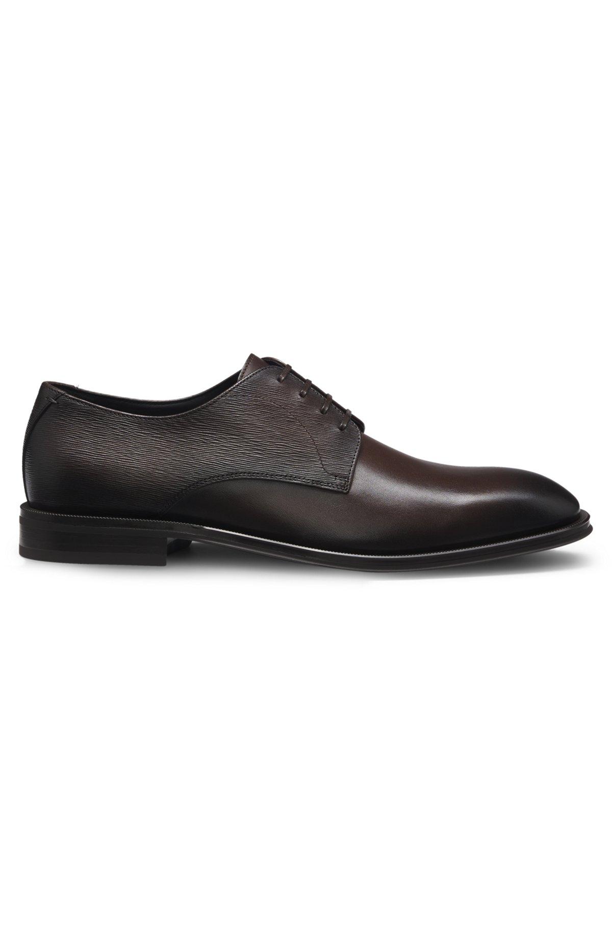 Plain and structured Derby shoes in leather Product Image