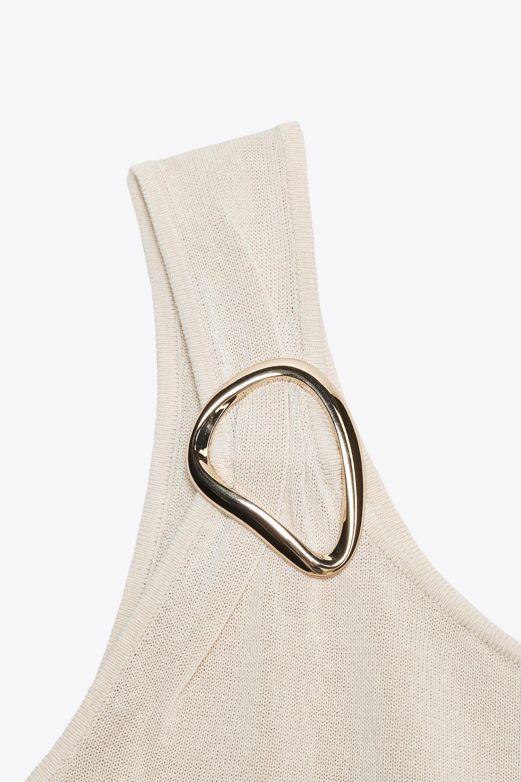 ASYMMETRIC KNIT TOP WITH HARDWARE Product Image