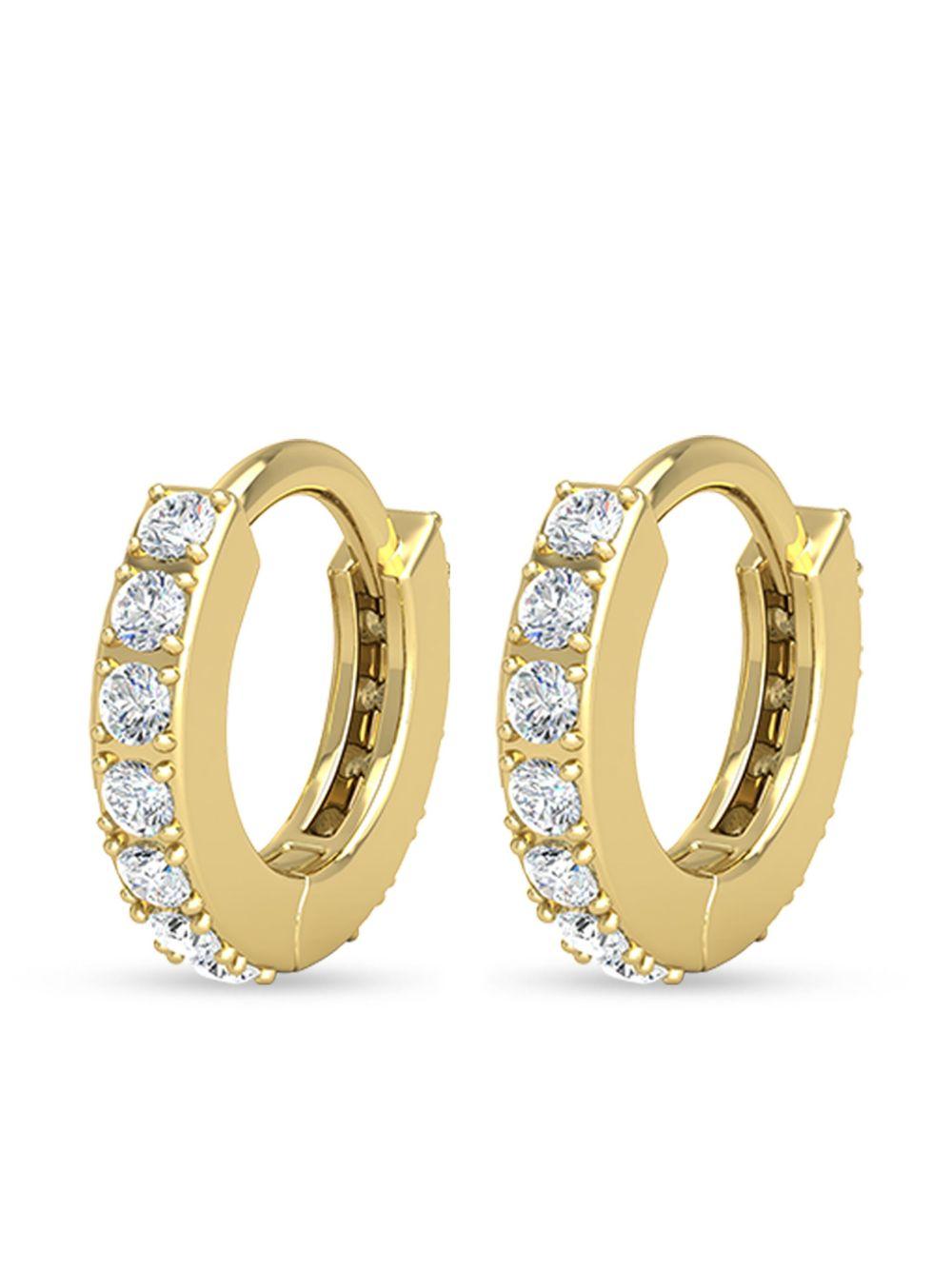 14kt yellow gold Mini Huggies diamond hoop earrings Product Image