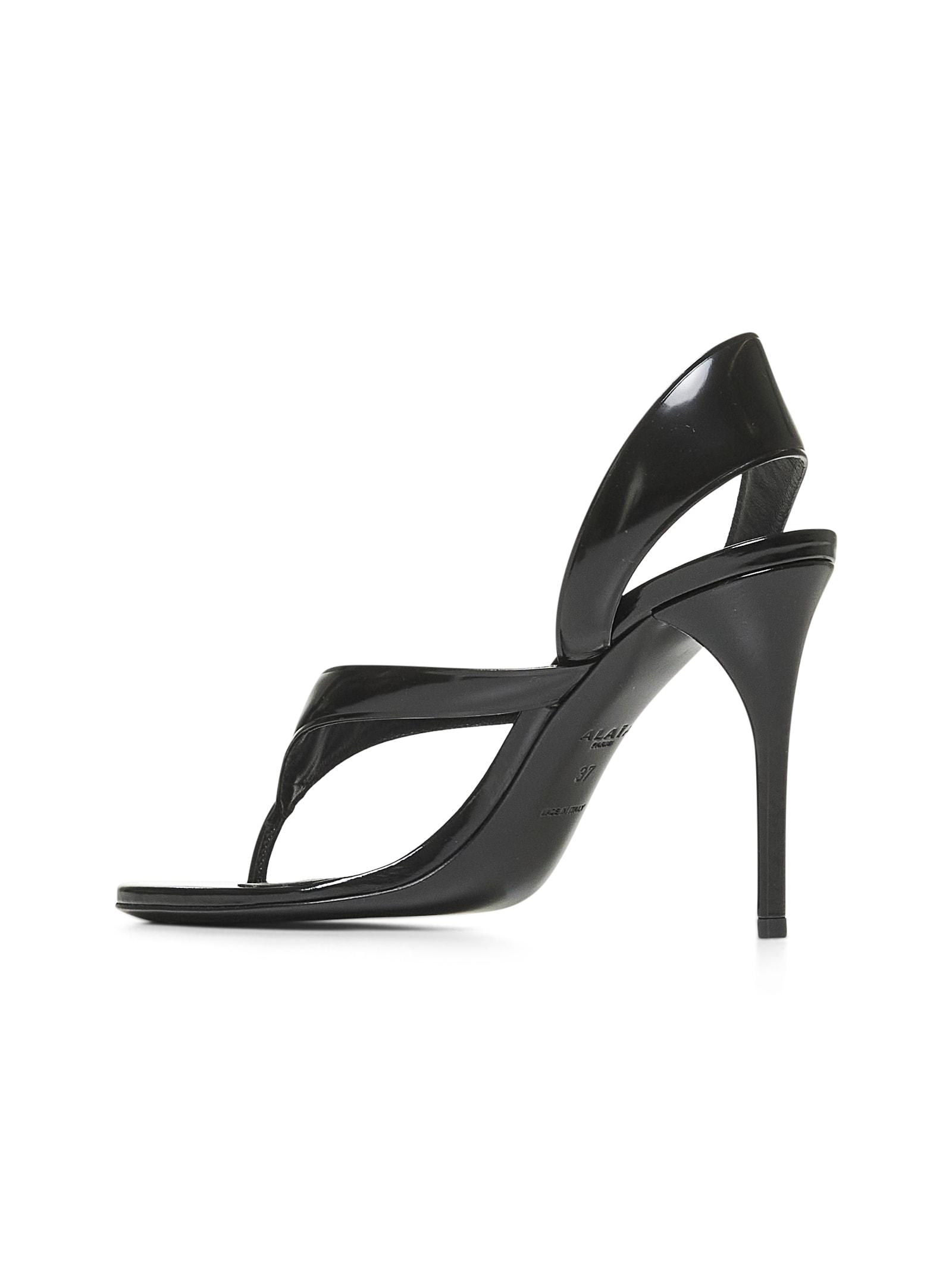 ALAÏA Leather Thong Slingback Sandals In Noir Product Image