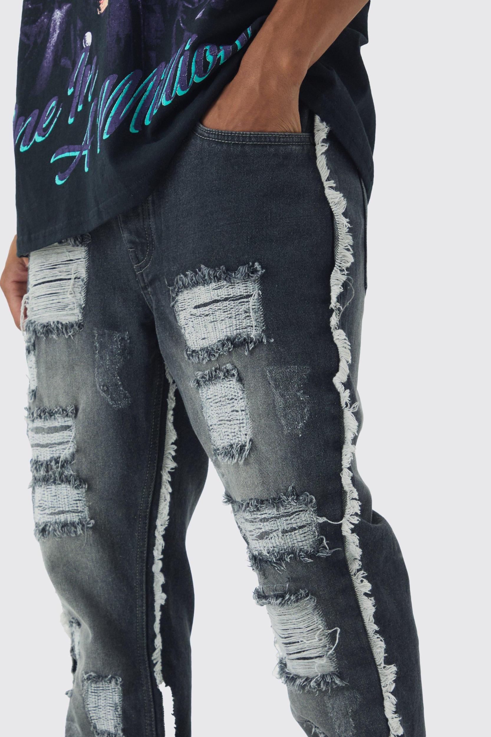 Slim Flared All Over Ripped Jeans With Let Down Hem | boohooMAN USA Product Image