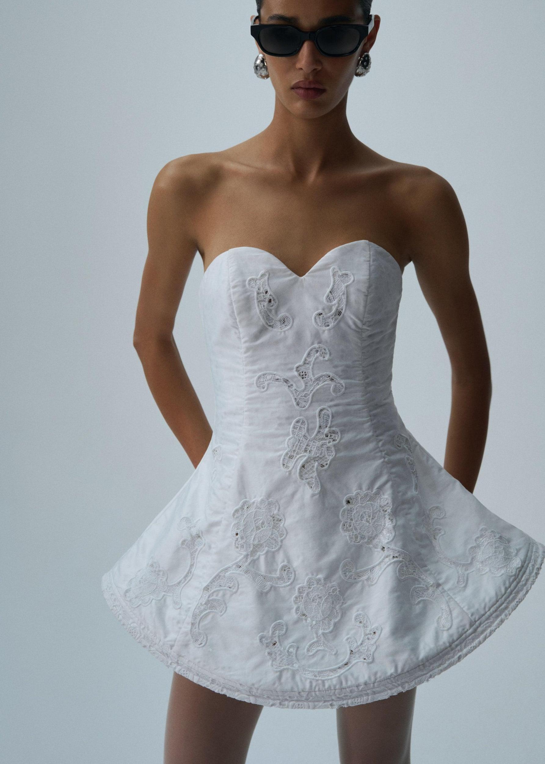 Lace poplin strapless babydoll mini dress in white Product Image