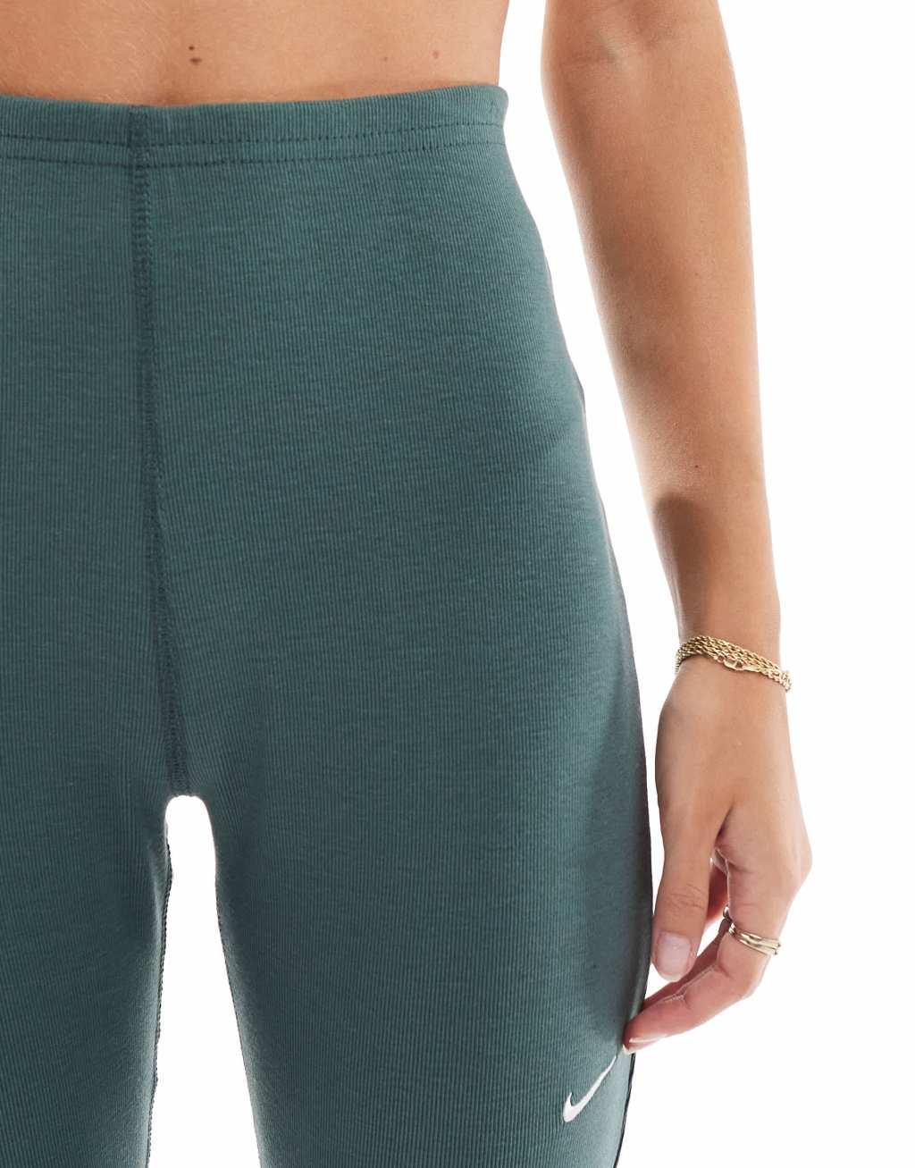 Nike Chill ribbed mid rise flared leggings in dark green Product Image