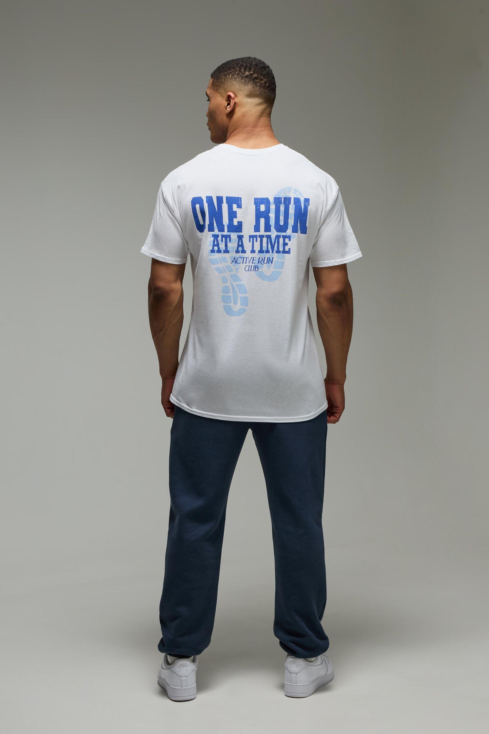 MAN Active Oversized One Run At A Time T-Shirt | boohooMAN USA Product Image