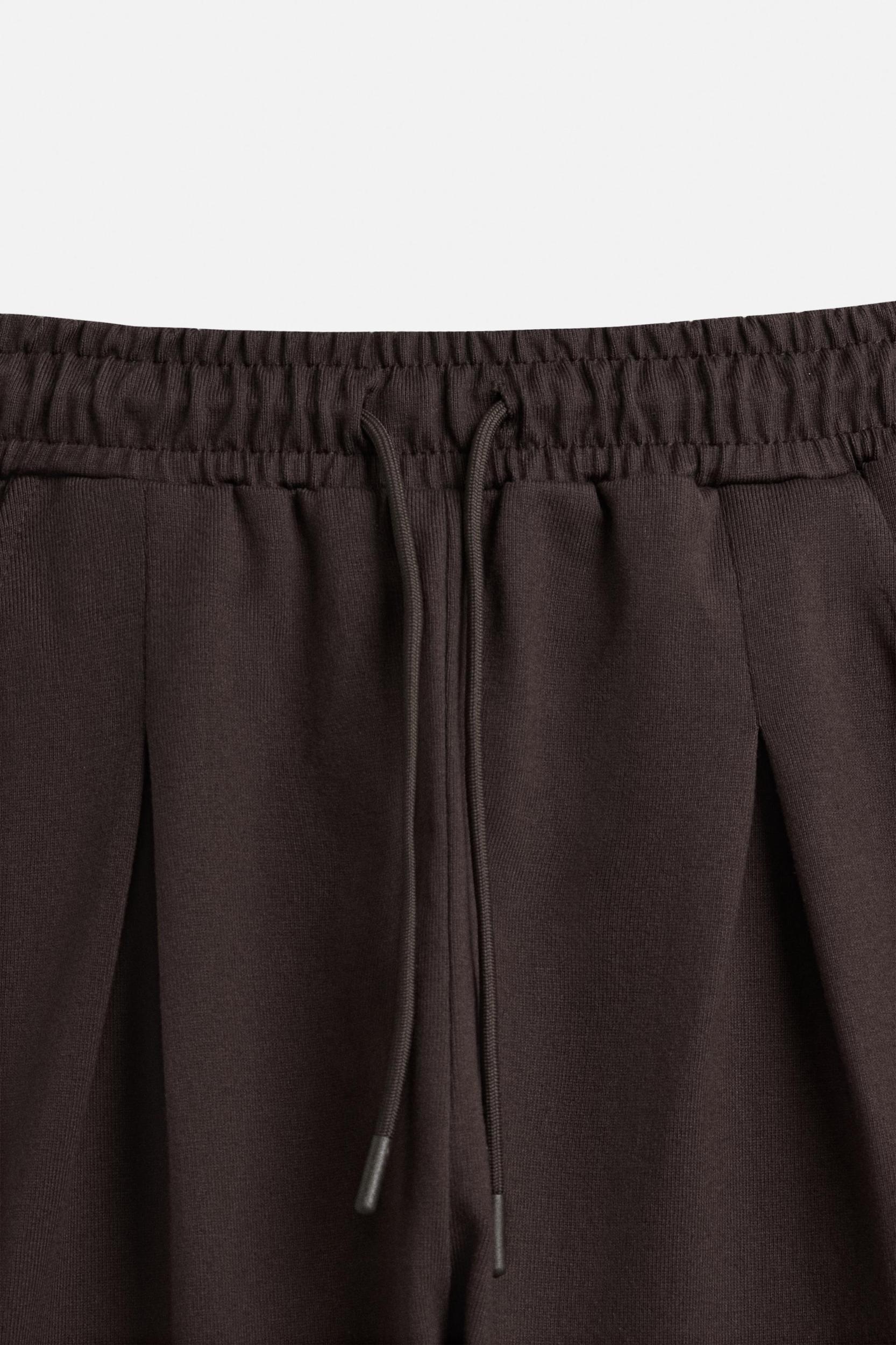 PLEATED OVERSIZED FIT BERMUDA SHORTS Product Image