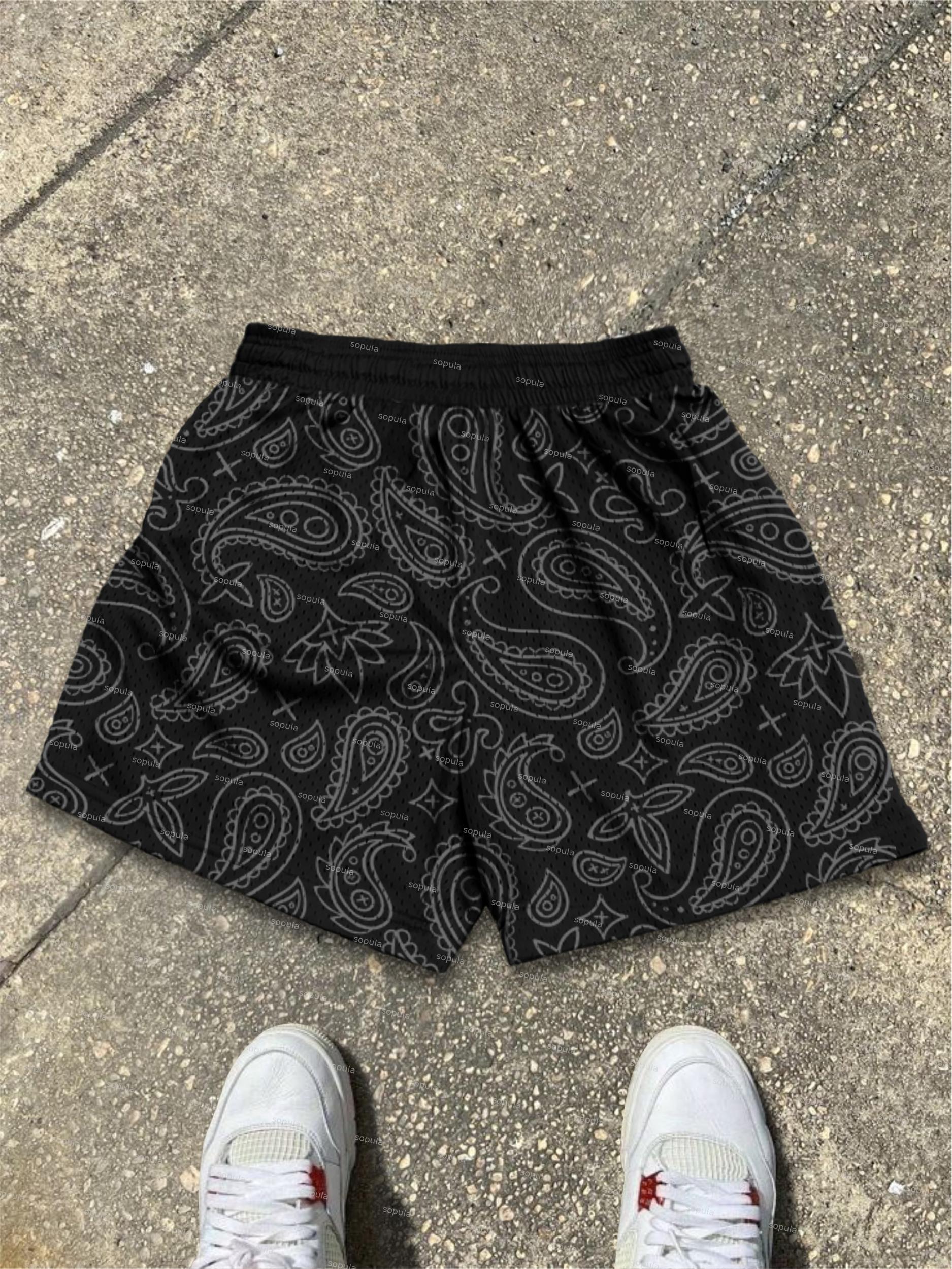 Ambition Skull Hand Cashew Flower Graphic Mesh Shorts Product Image