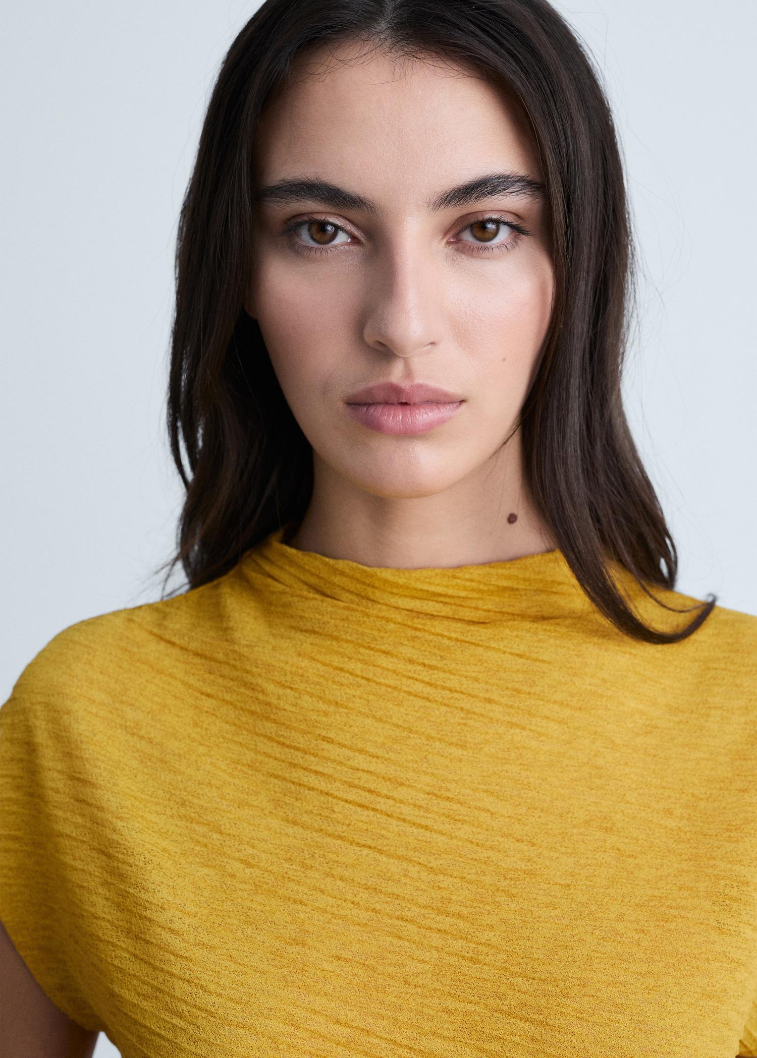 Asymmetrical textured top - Women | MANGO USA Product Image