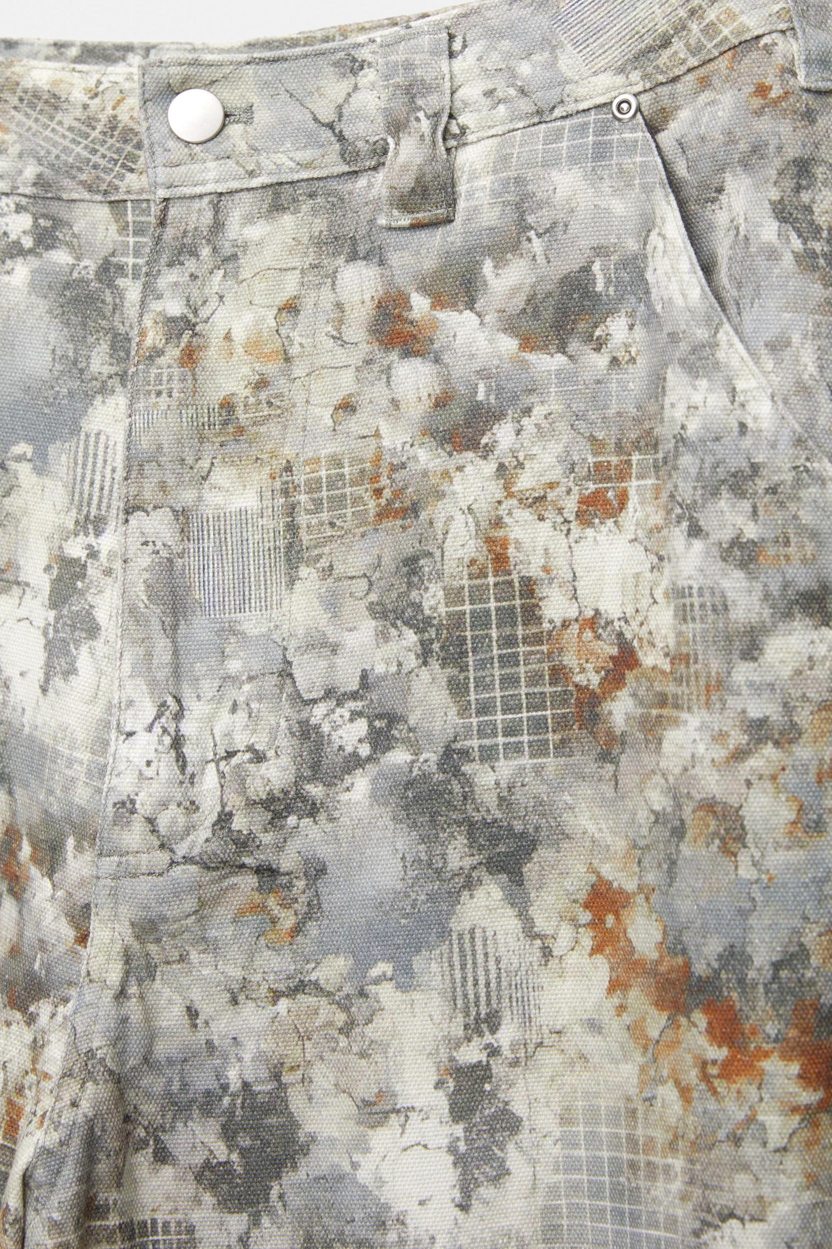 Camouflage print carpenter jeans Product Image